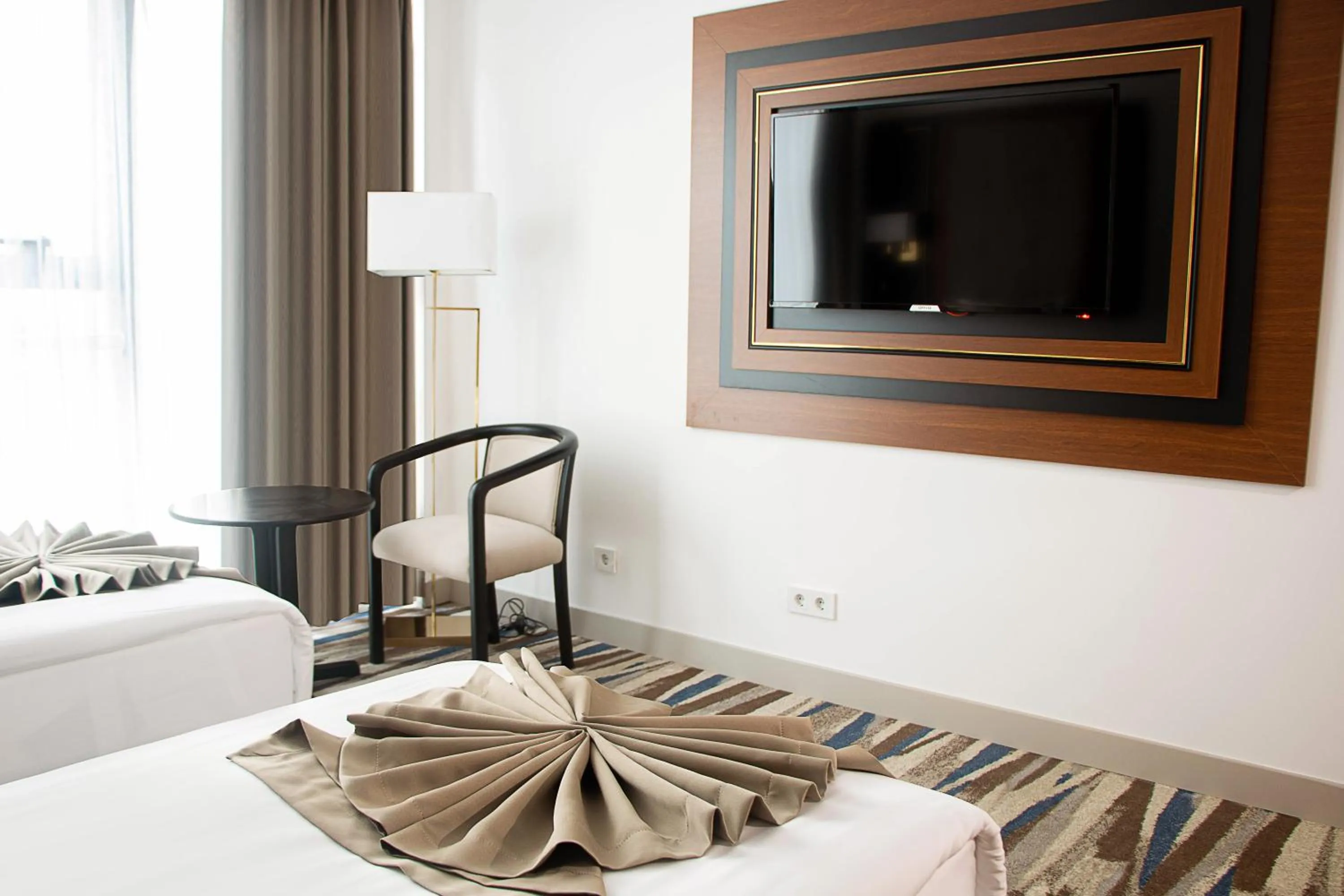 Bed in Shelter Inn Hotel & Spa