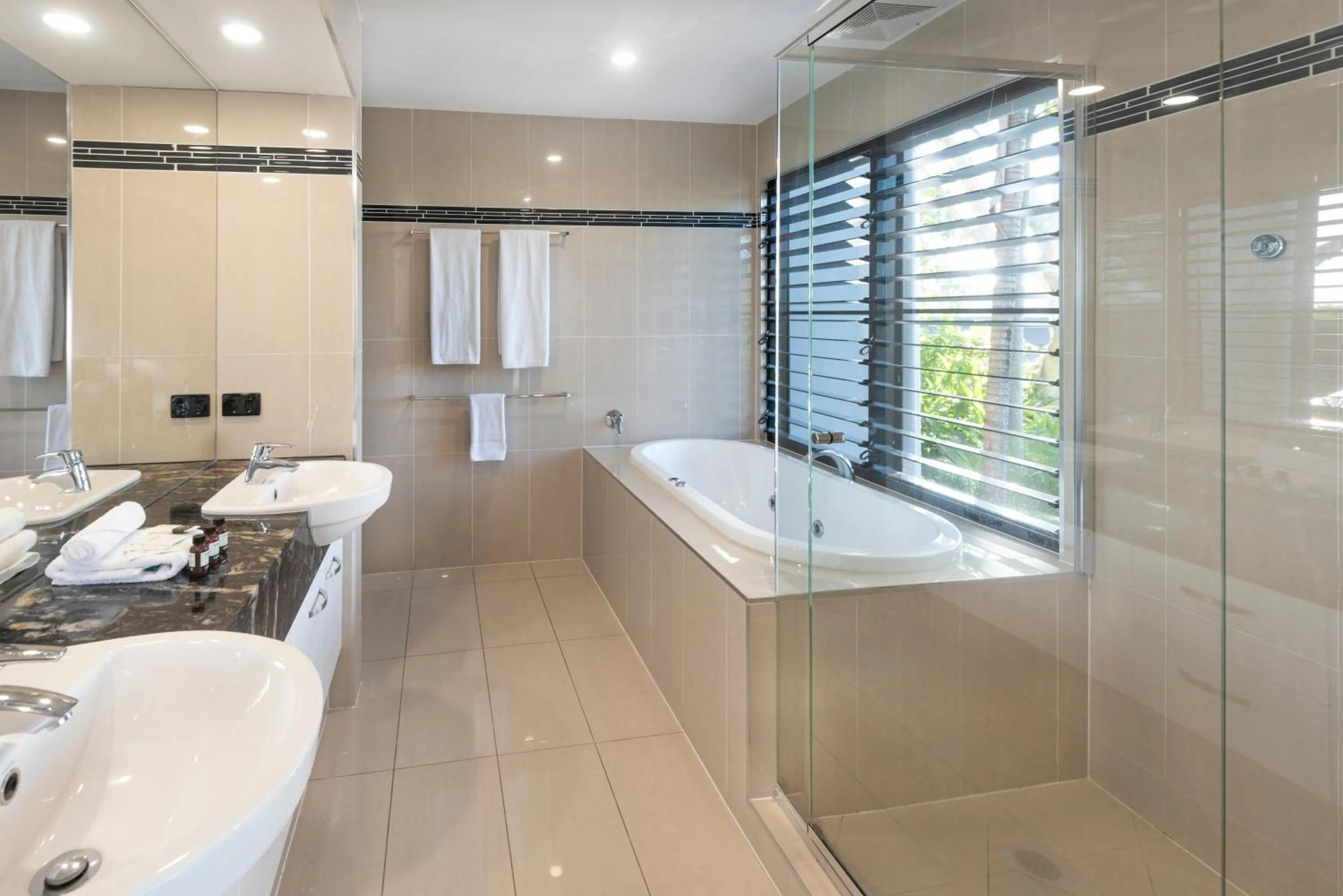 Bathroom in Pinnacle Apartments on Hamilton Island by HIHA