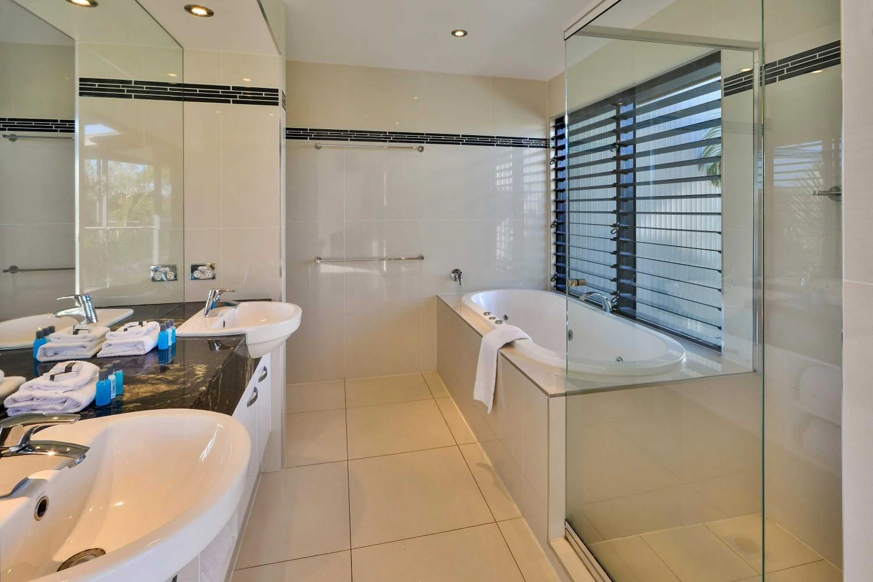 Bathroom in Pinnacle Apartments on Hamilton Island by HIHA