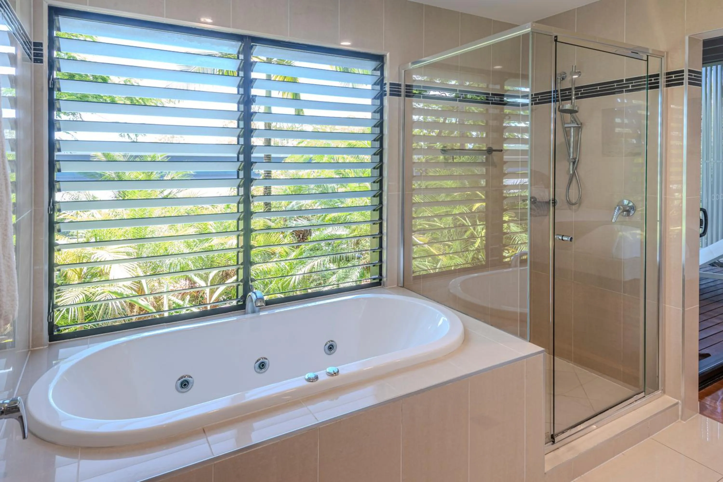 Bathroom in Pinnacle Apartments on Hamilton Island by HIHA