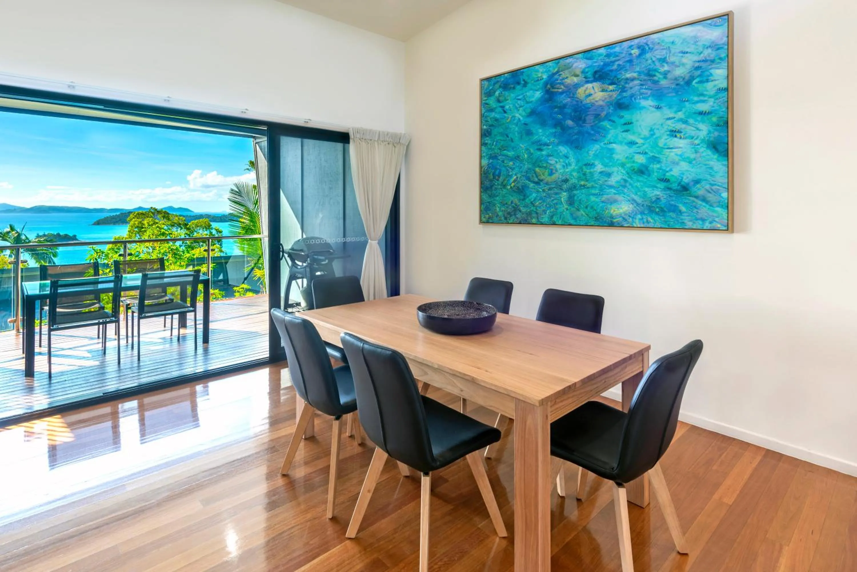 Dining area in Pinnacle Apartments on Hamilton Island by HIHA