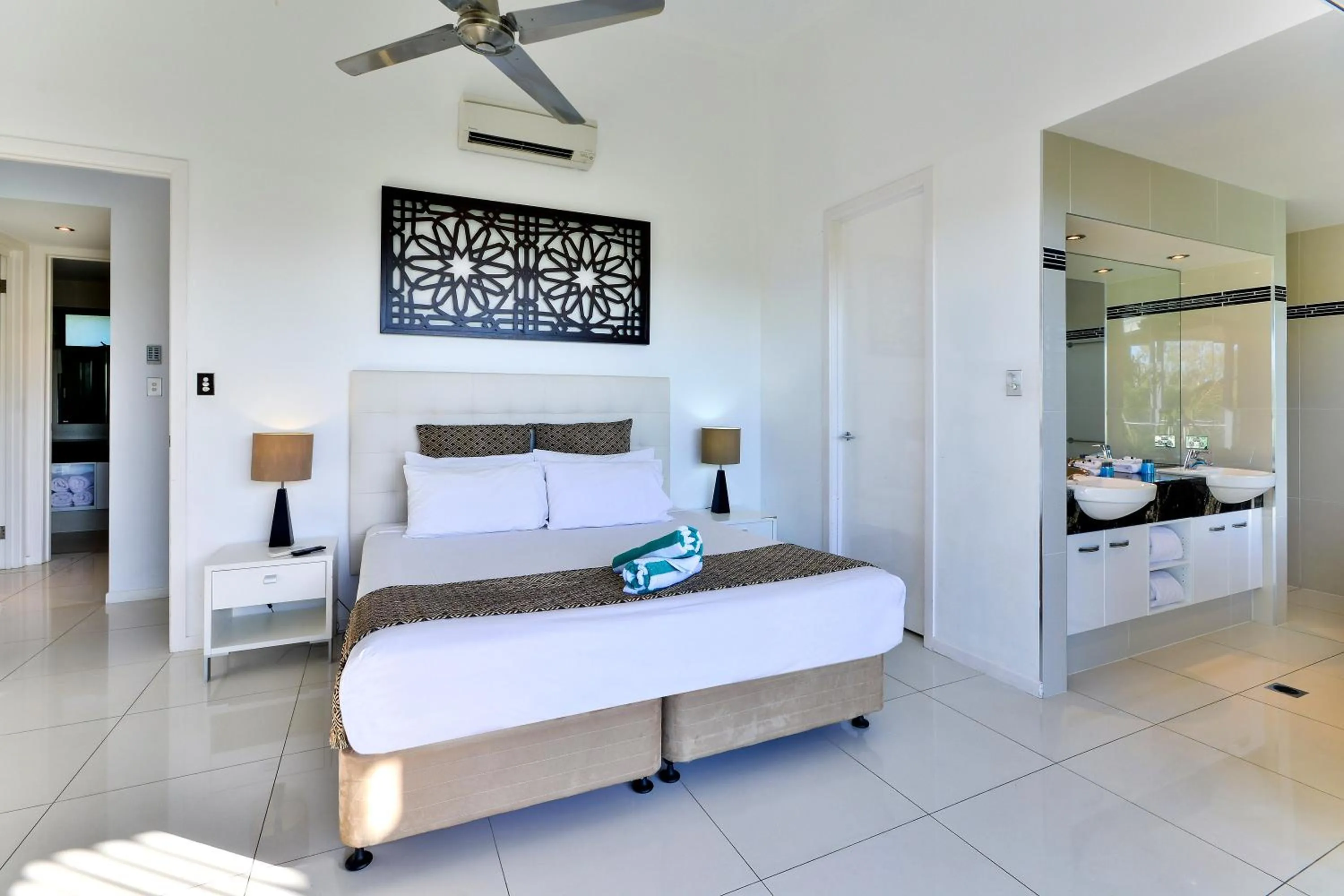Bedroom, Bed in Pinnacle Apartments on Hamilton Island by HIHA