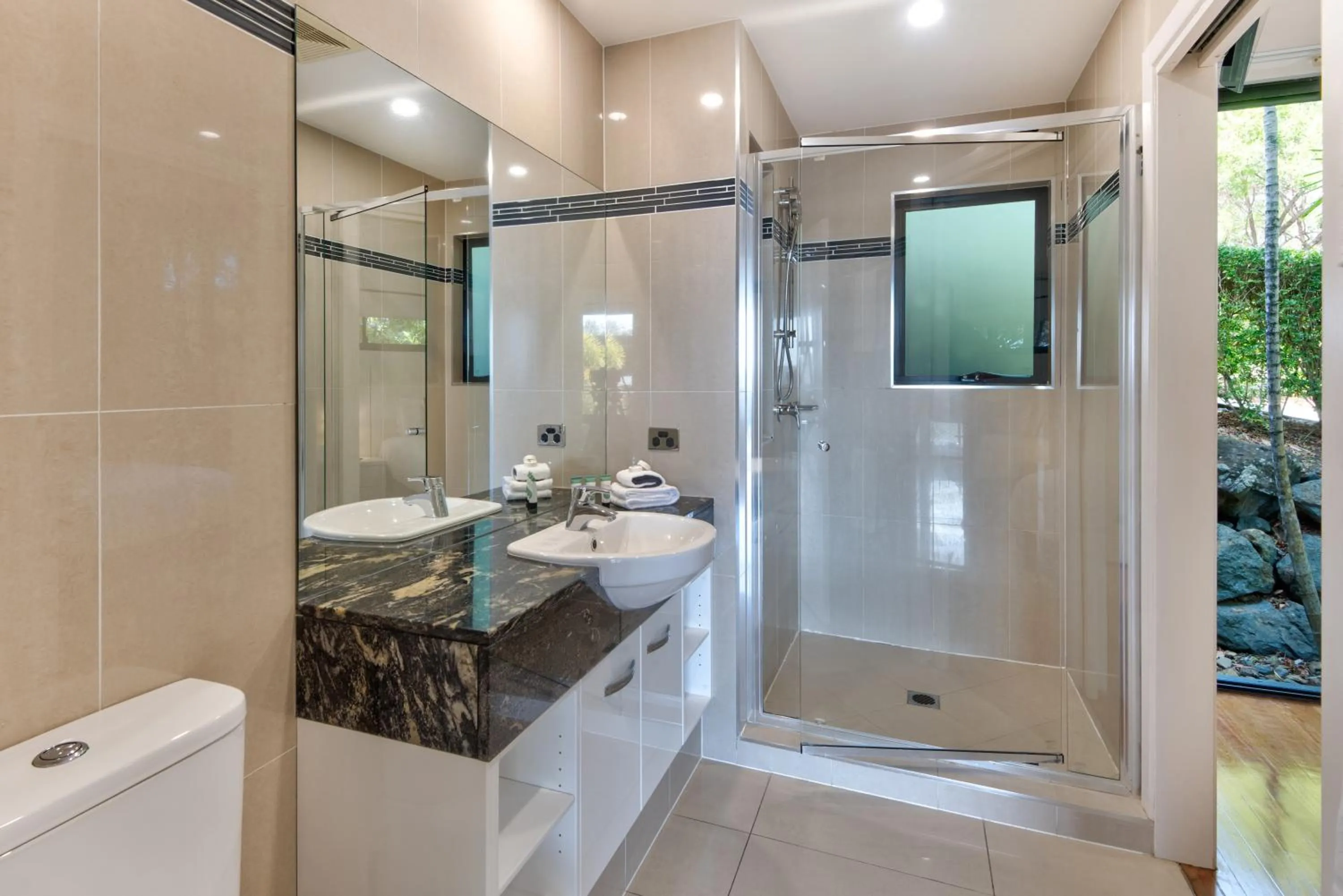 Bathroom in Pinnacle Apartments on Hamilton Island by HIHA