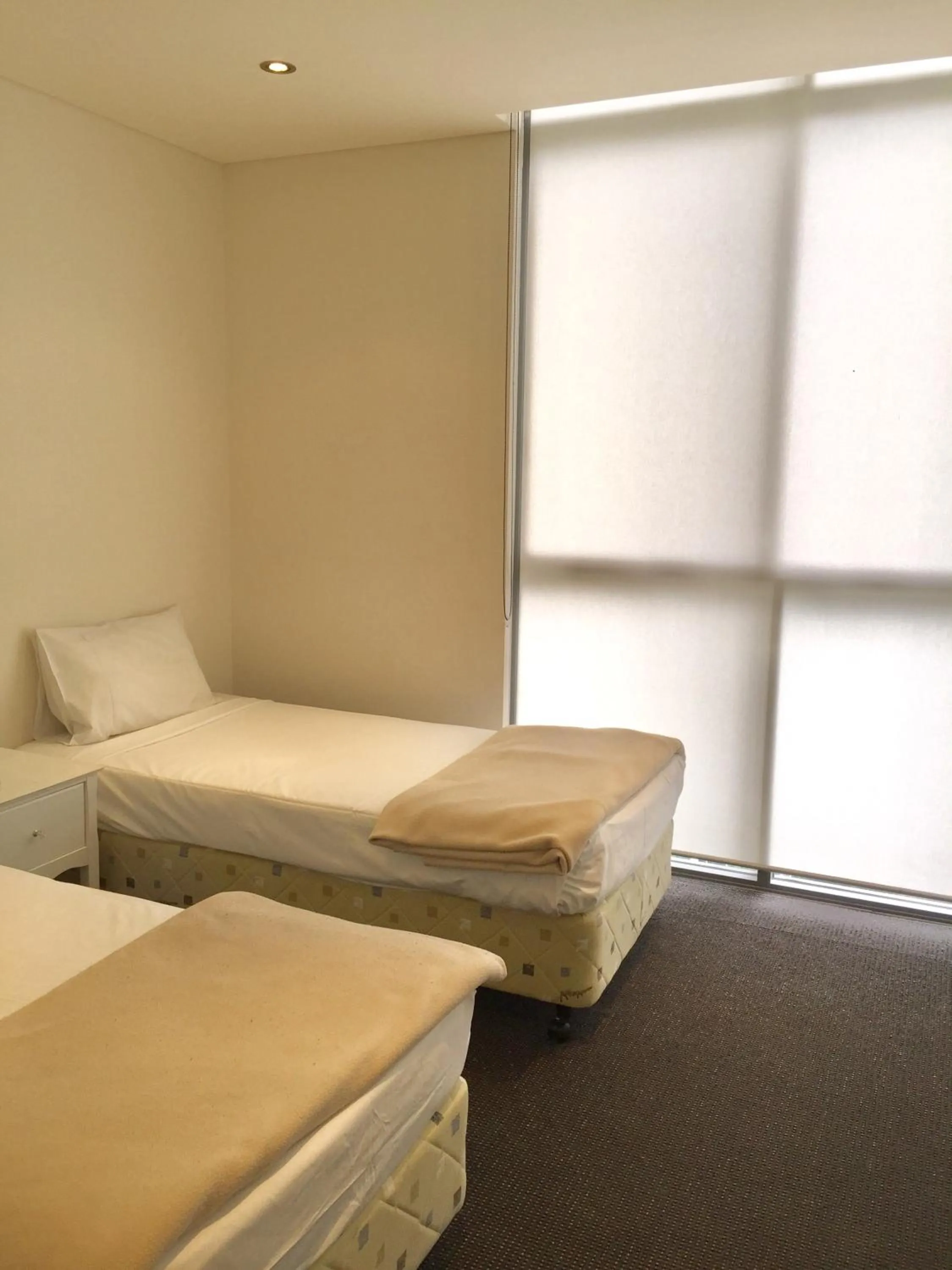 Bed in Solaire Apartments