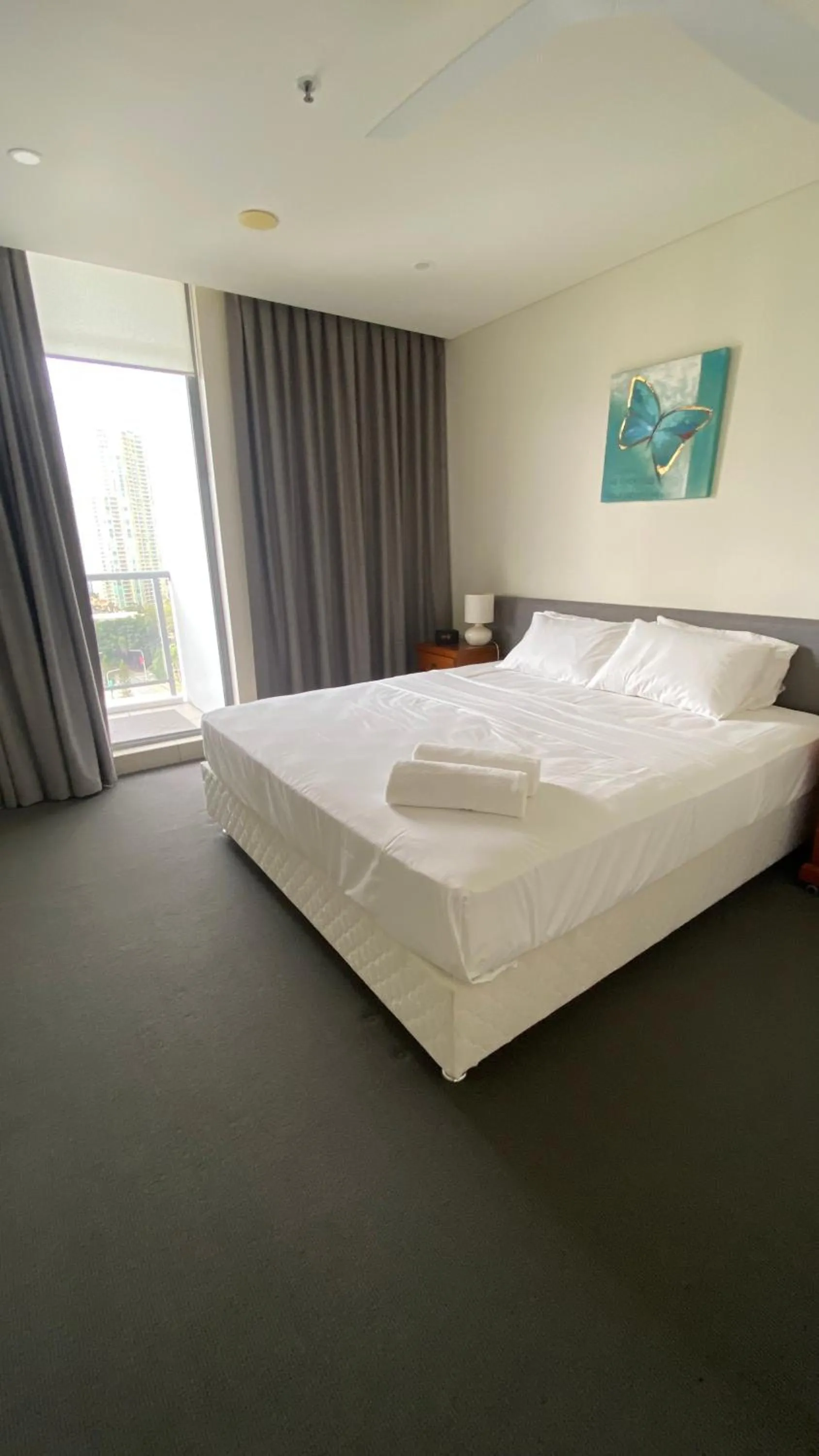 Bed in Solaire Apartments