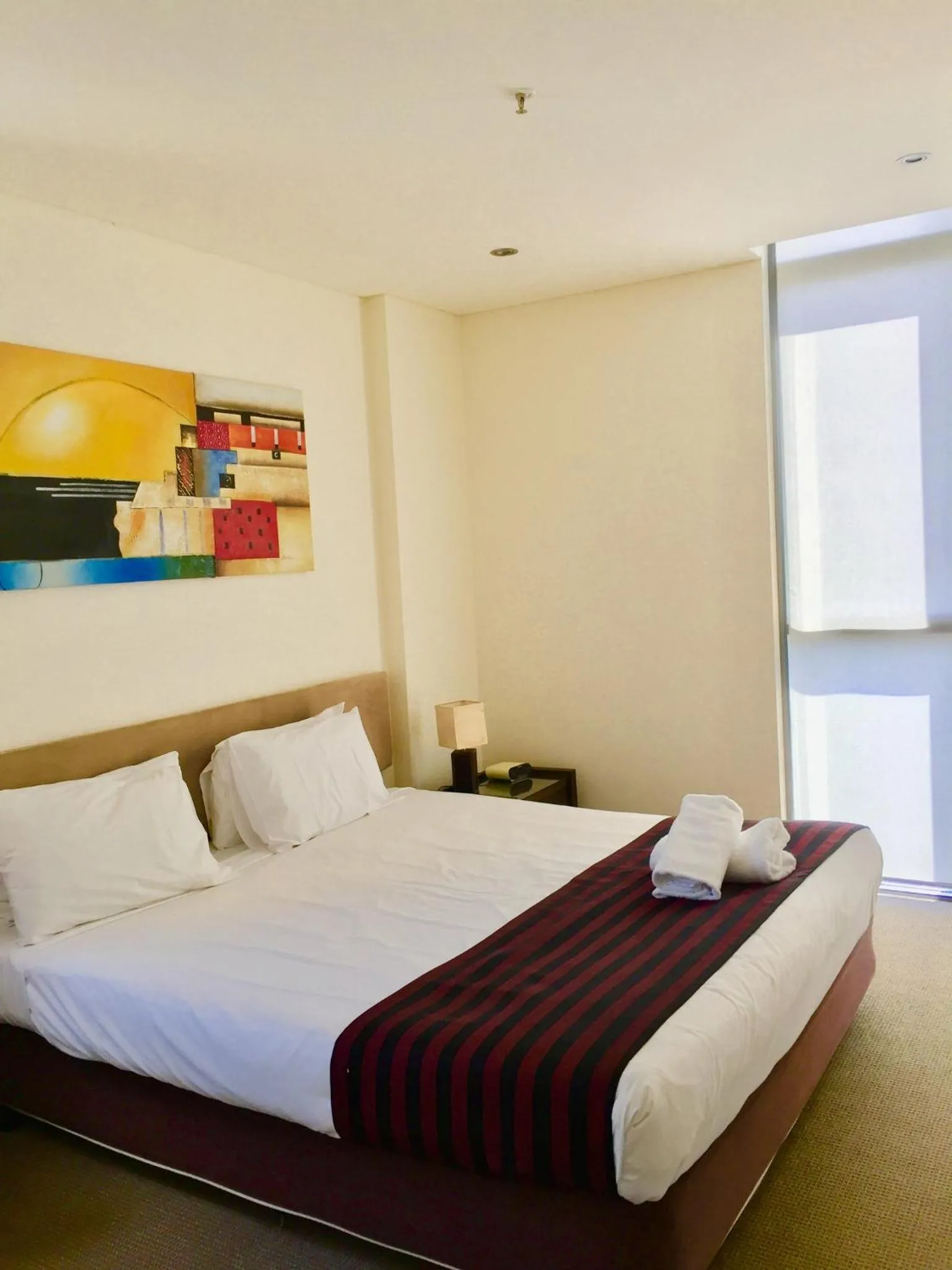 Bed in Solaire Apartments