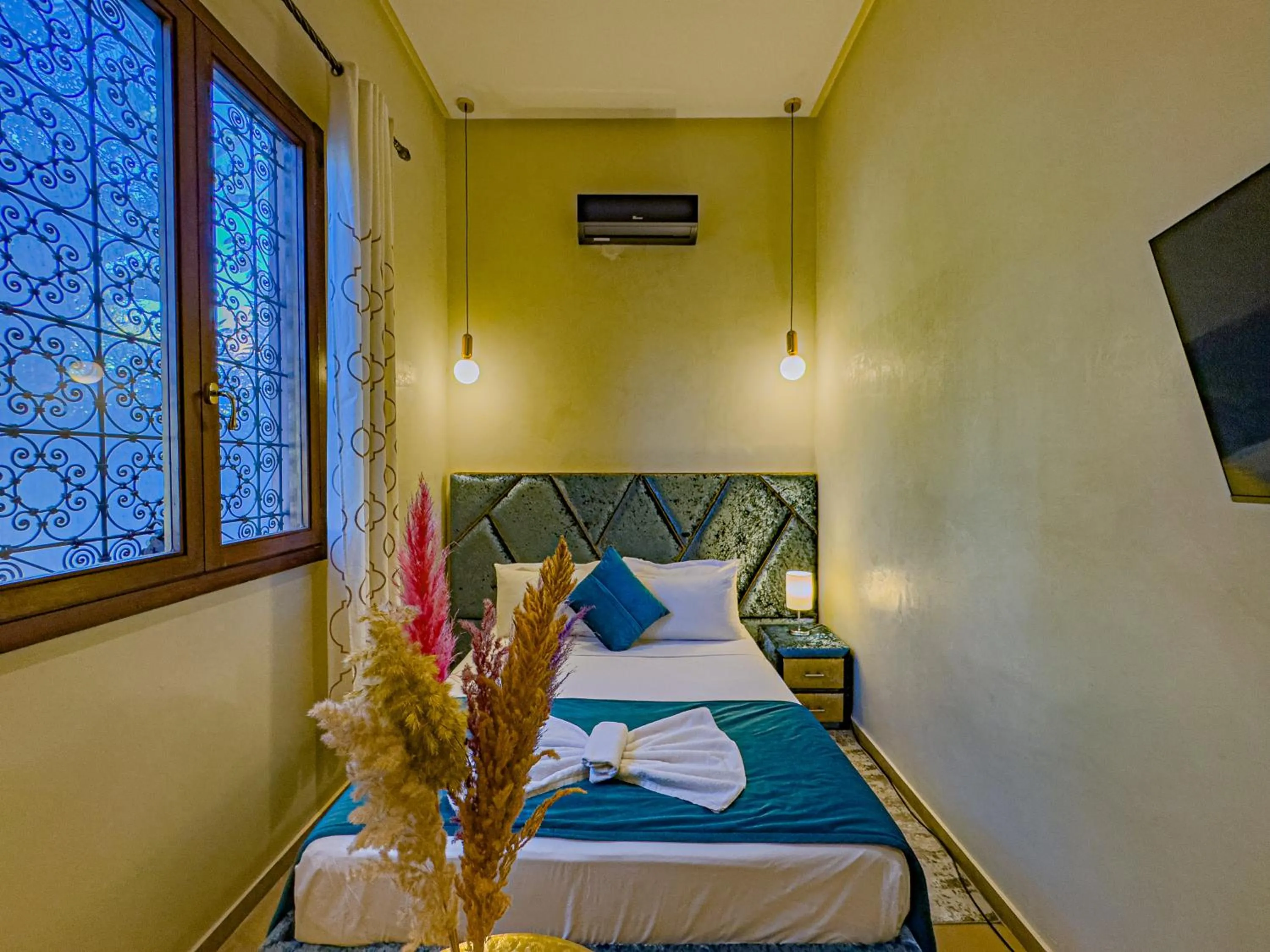Bed in Riad Azia