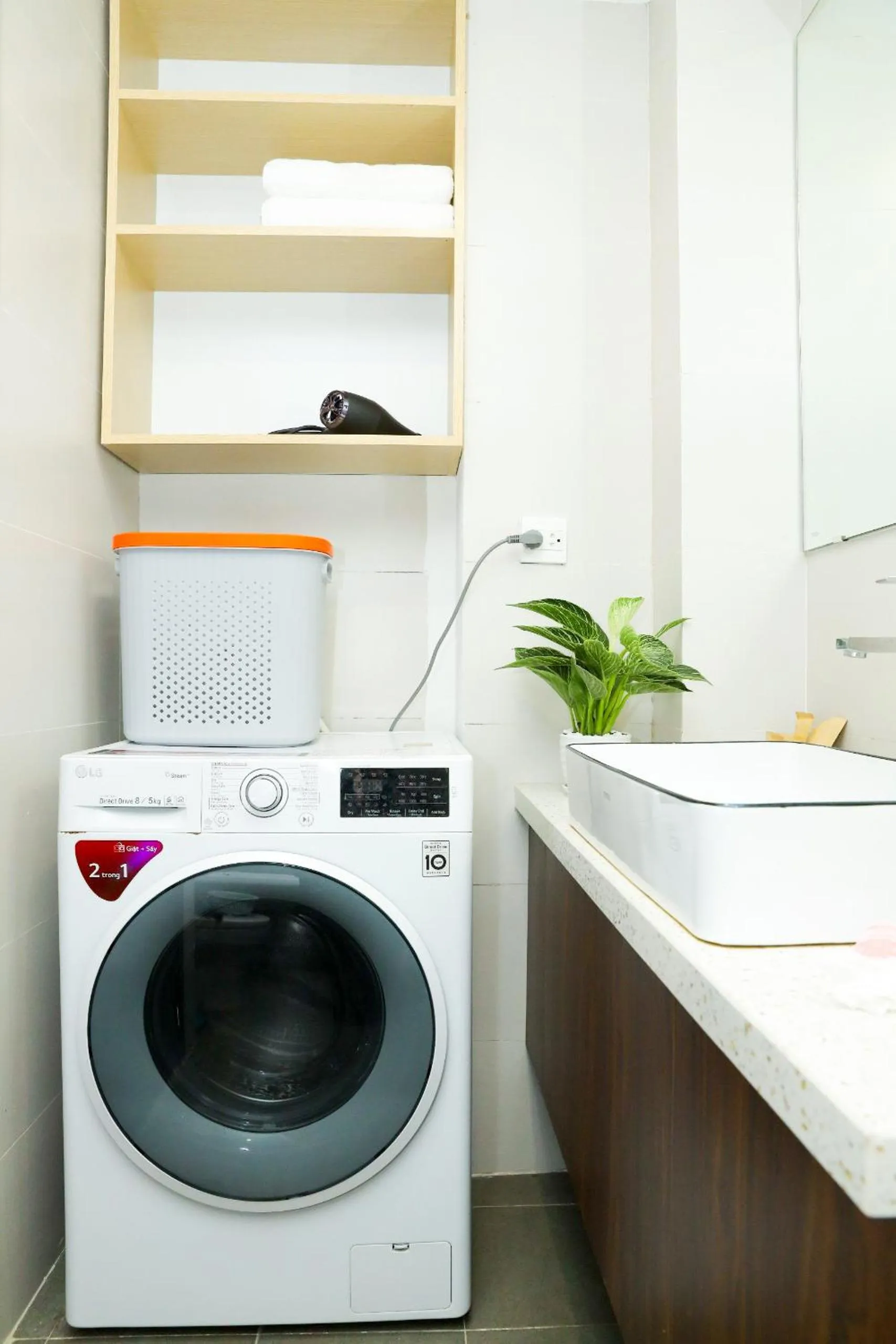 washing machine in Wins Apartment