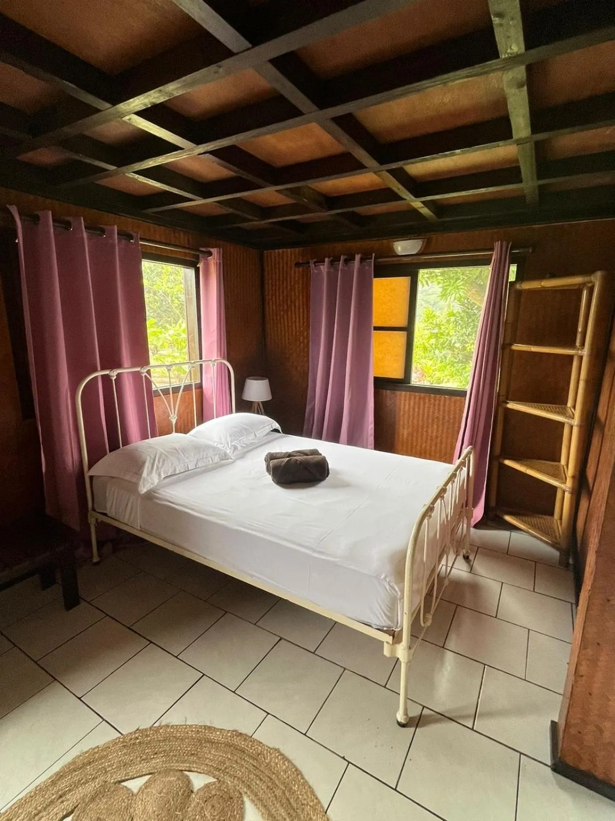 Bed in Pension Hibiscus Taha'a