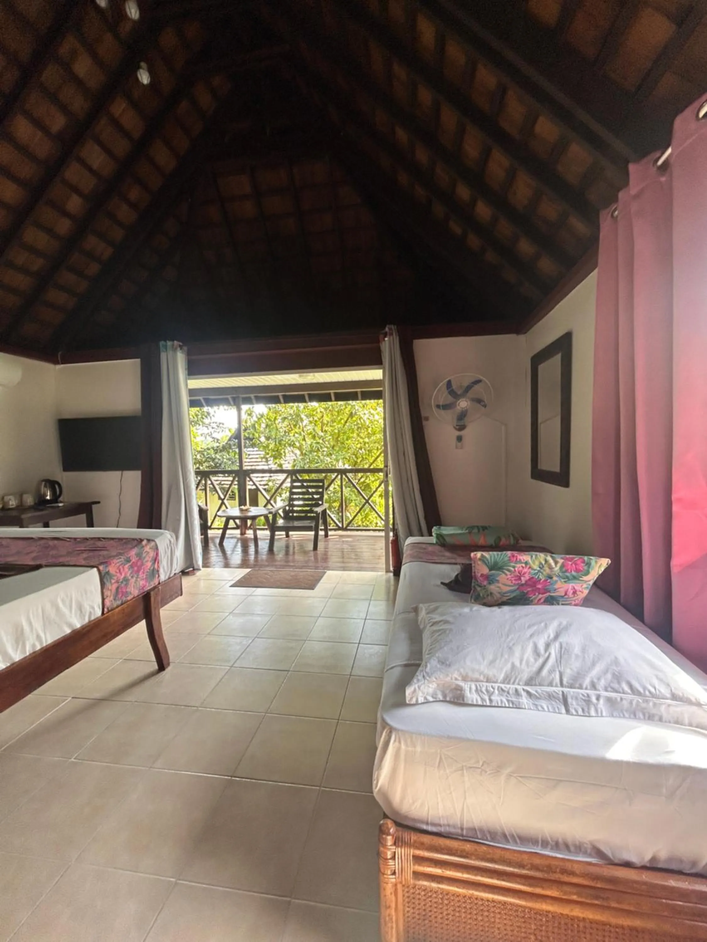 Property building, Bed in Pension Hibiscus Taha'a