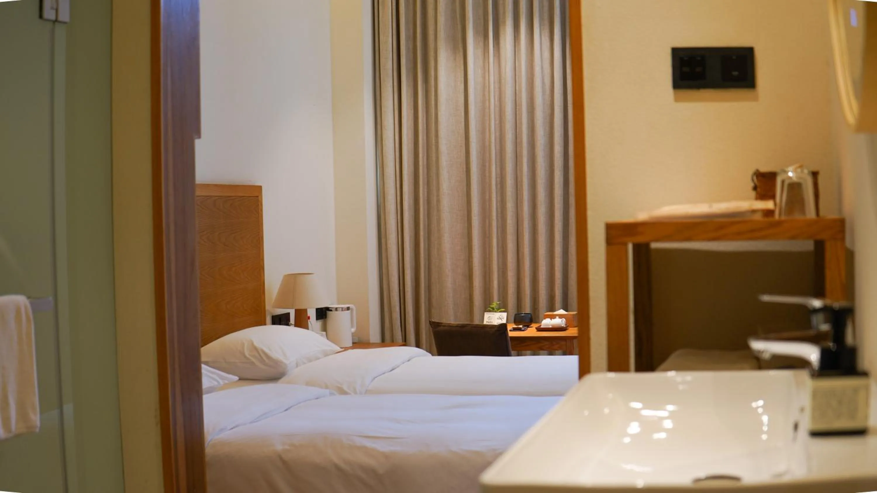 Property building, Bed in Taihua Wutong Hotel