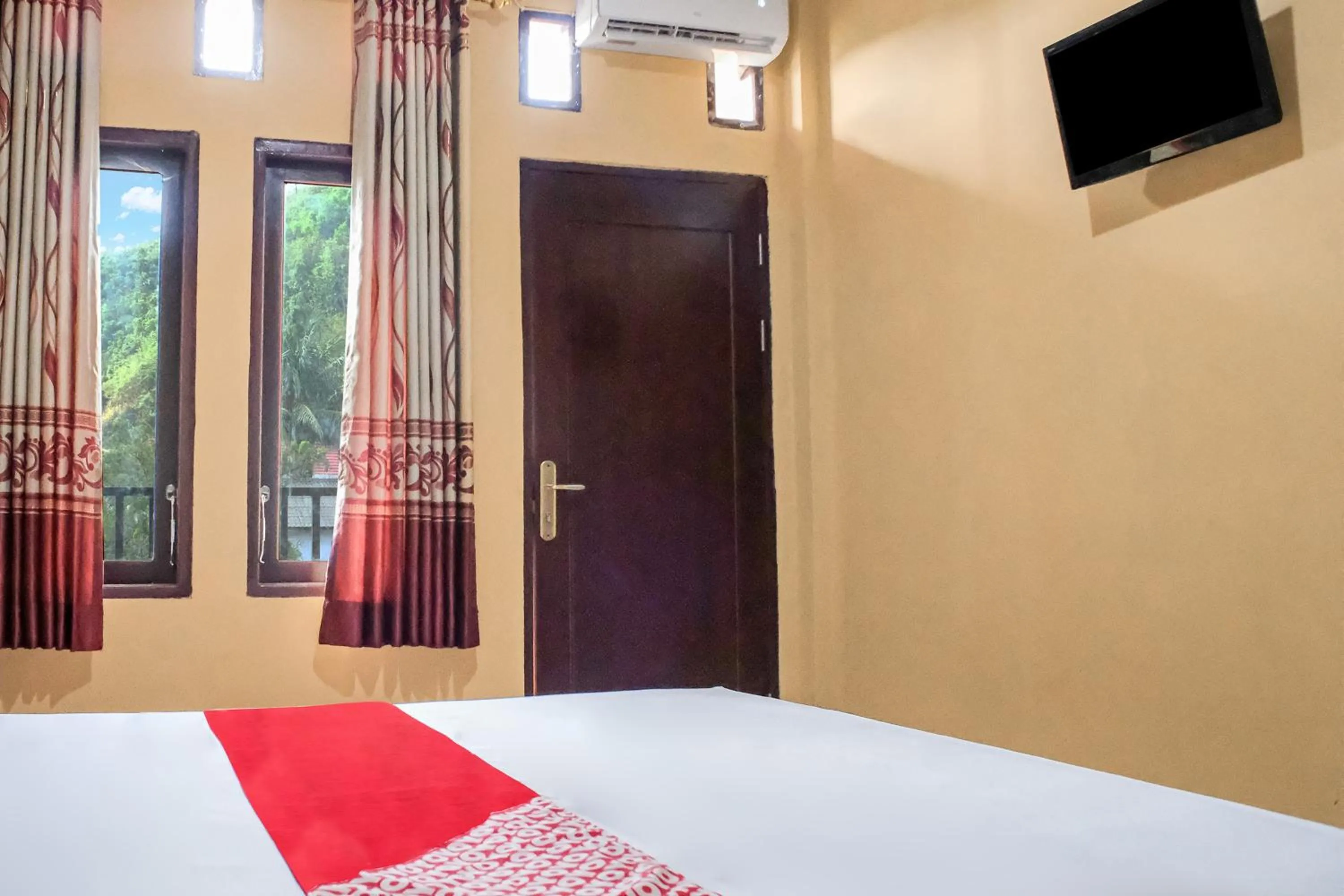 Bedroom, Bed in OYO 93332 Kharis Home Stay