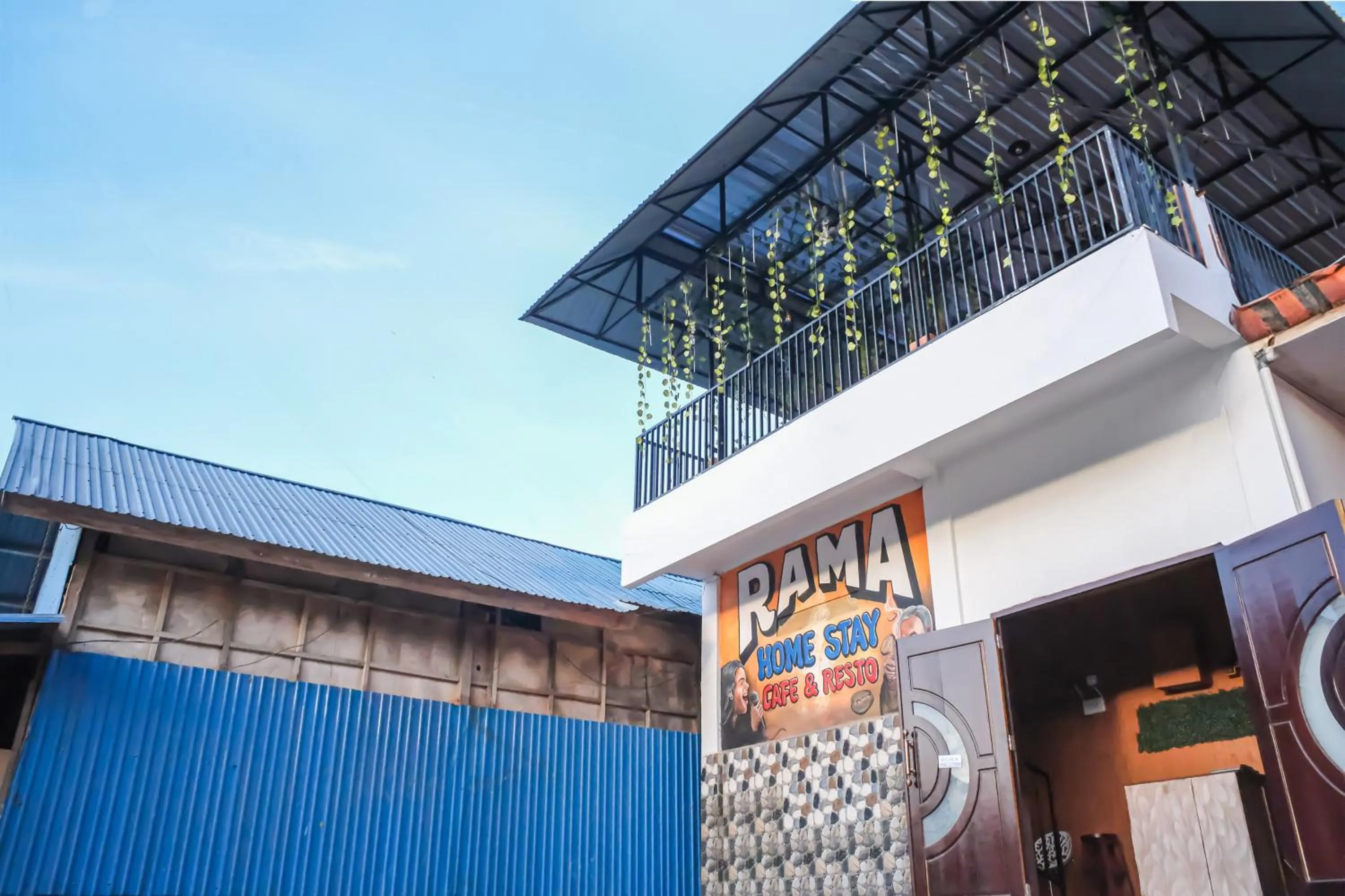 Facade/entrance in OYO 93333 Rama Home Stay