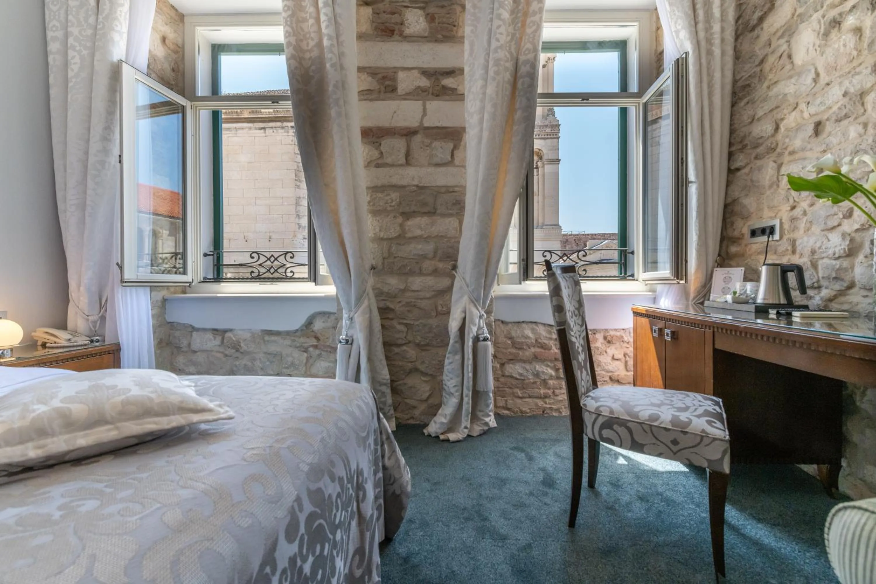 Bed in Heritage Hotel Antique Split