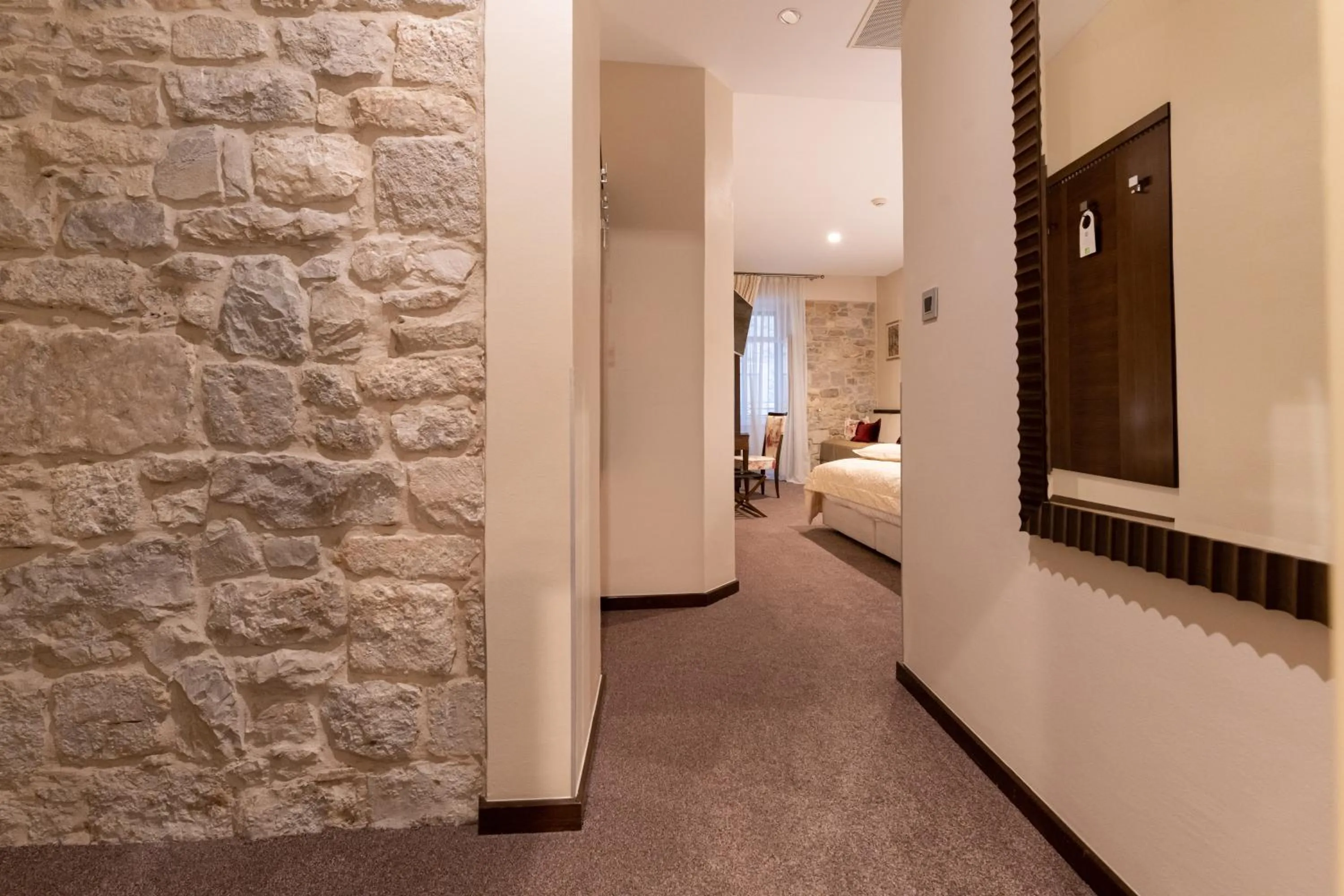 Decorative detail, Bed in Heritage Hotel Antique Split