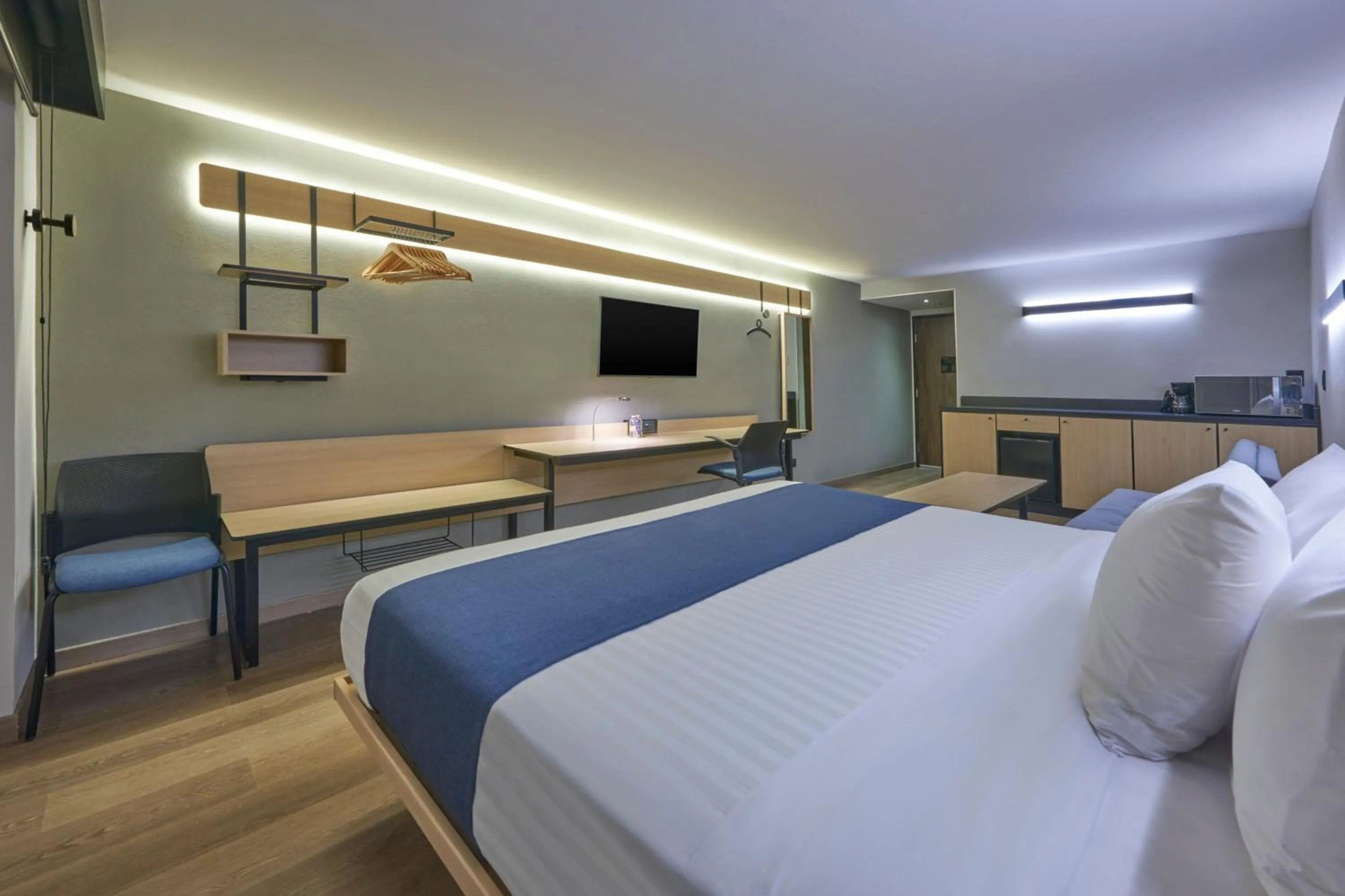 Photo of the whole room, Bed in City Express by Marriott Cancun Aeropuerto