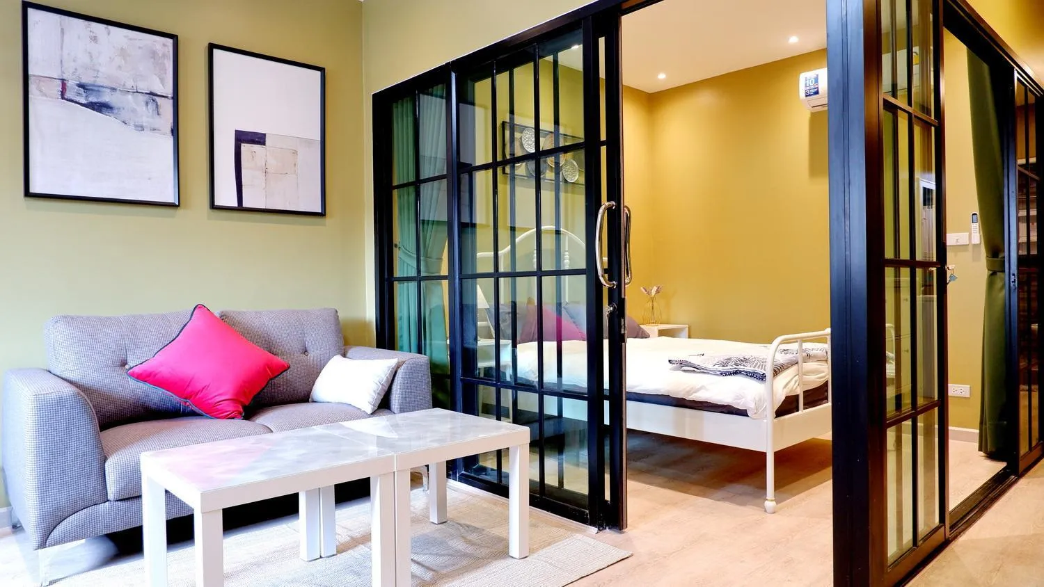 Living room, Bed in BEB Silom Condolette