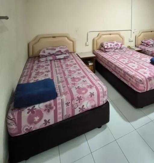 Bedroom in OYO 90895 Hotel Ikia