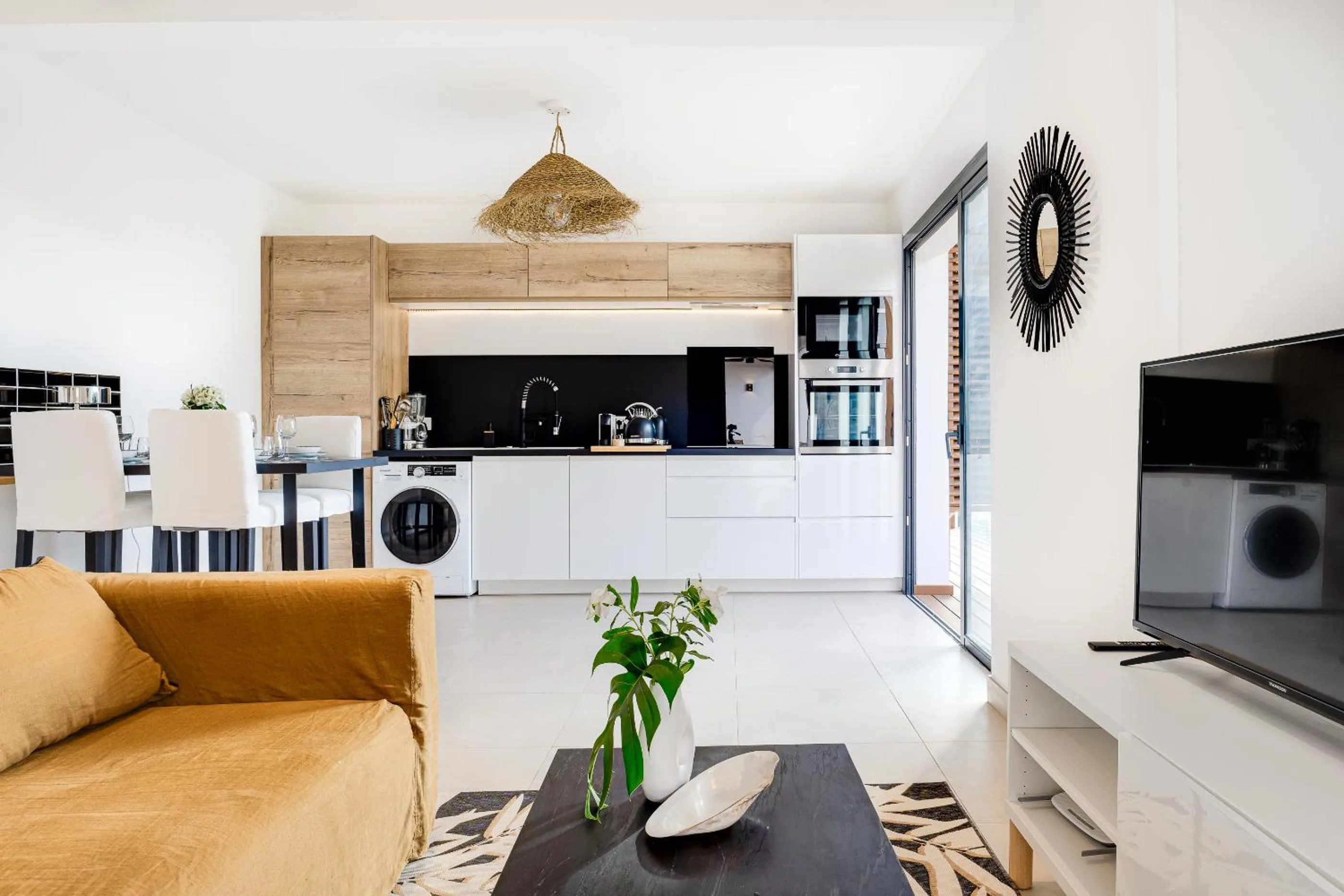 Communal lounge/ TV room in Le Moma by the ocean