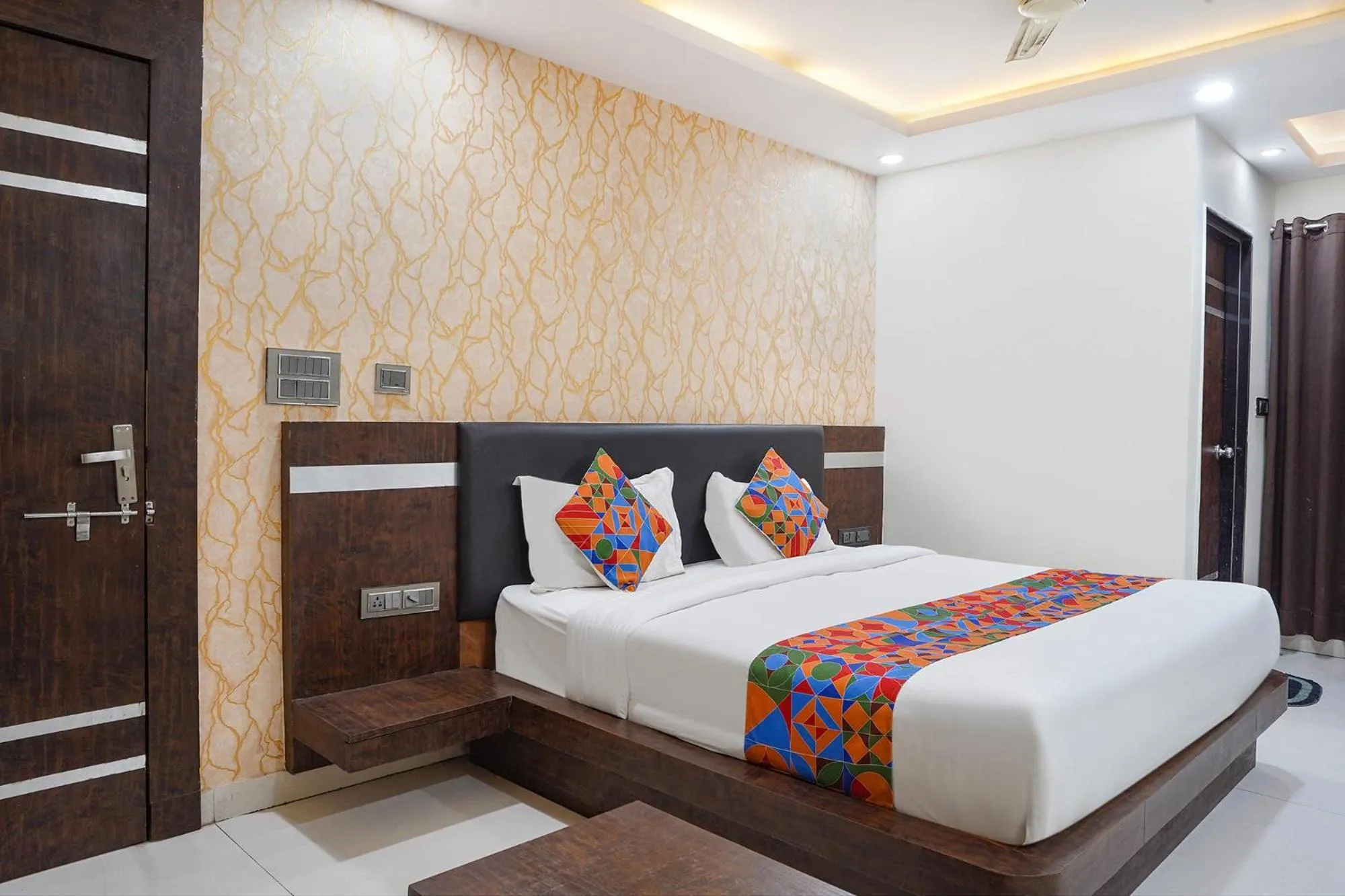 Bed in FabHotel Jalsa DLX