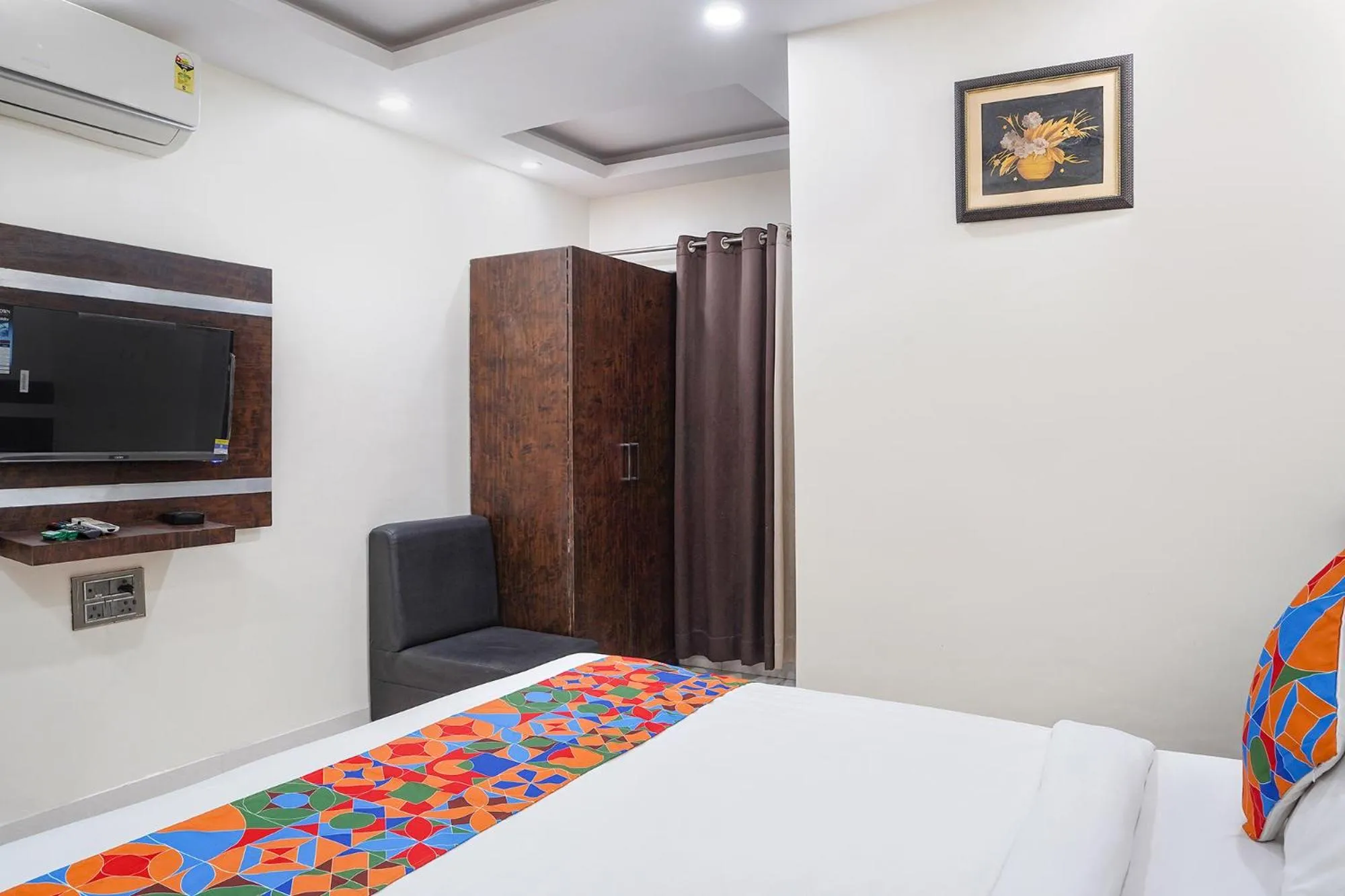 Bed in FabHotel Jalsa DLX