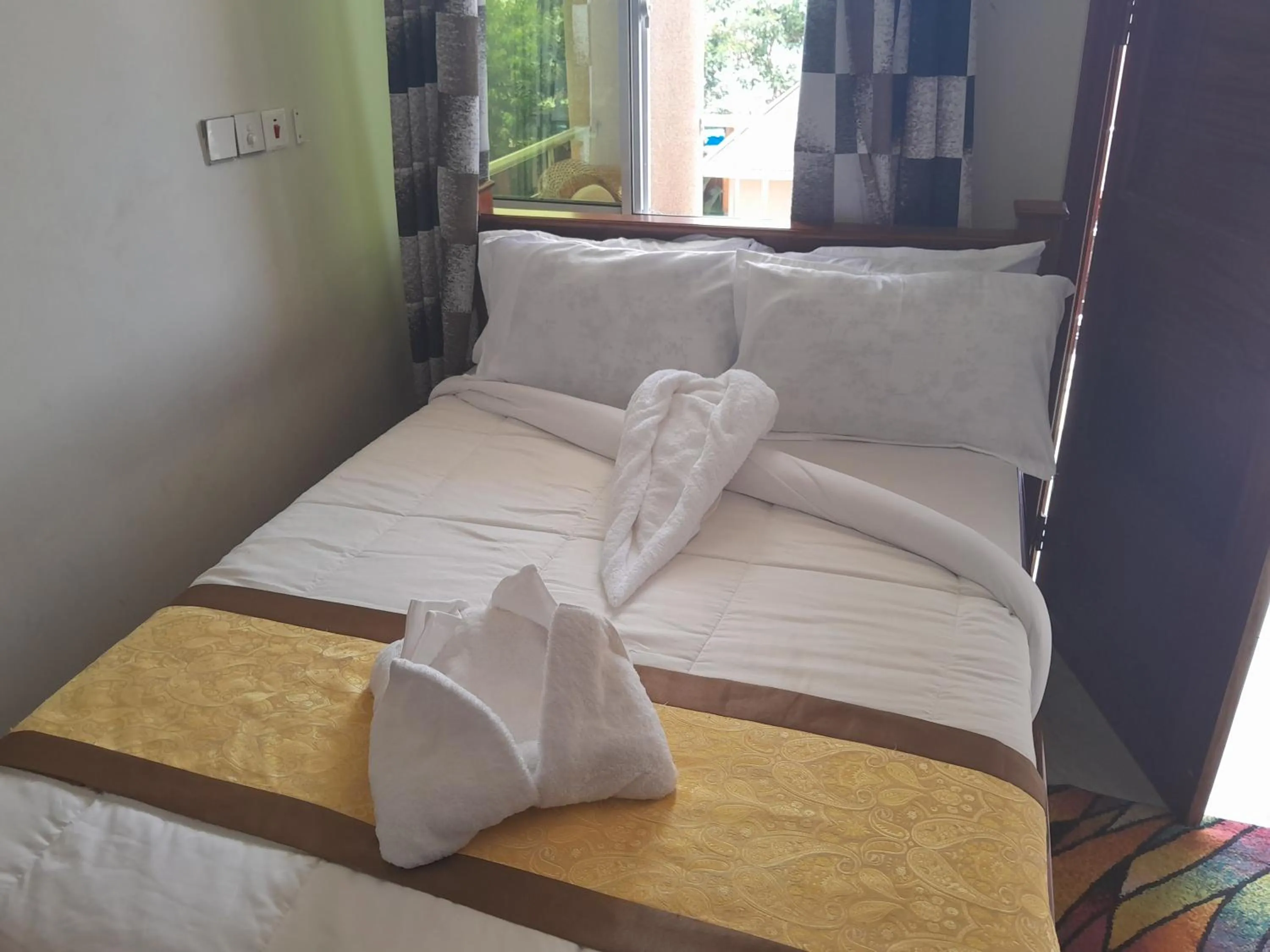 Bed in PALAZZO GARDEN RESORT MATEMA