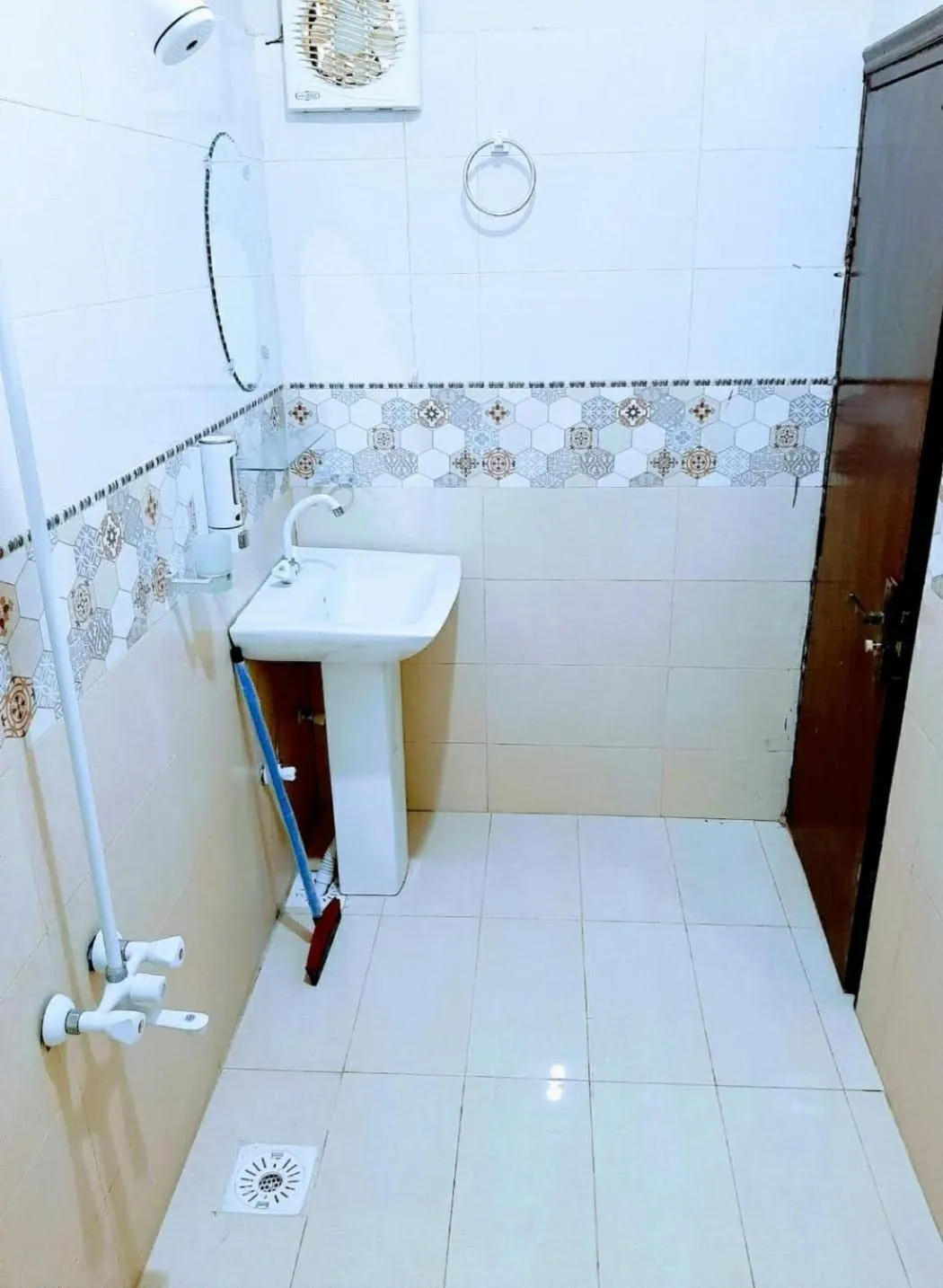 Shower in Galaxy Inn Guest House