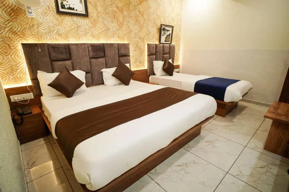 Bed in Hotel Mahaveer
