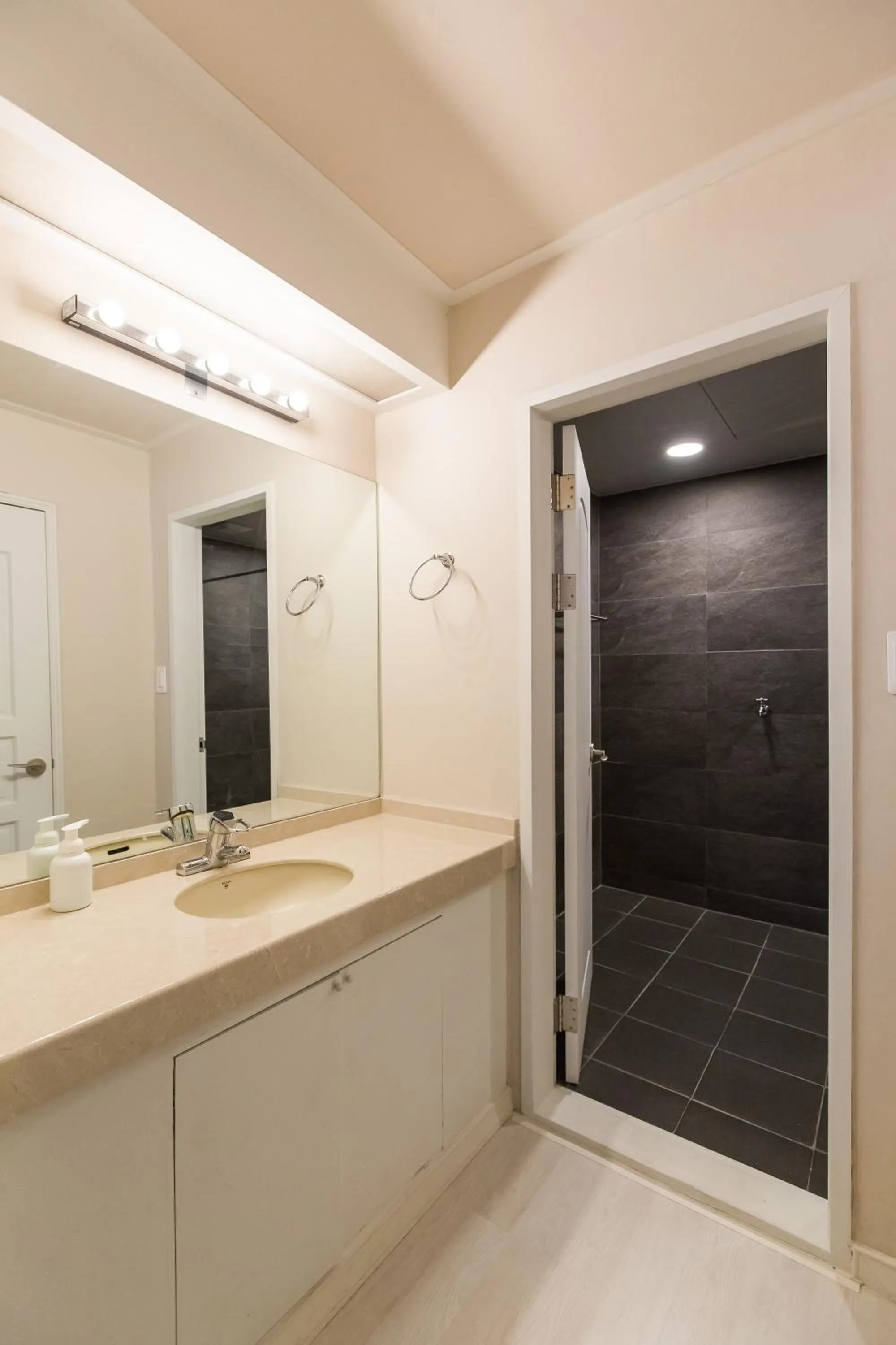 Shower in CANVAS BLACK Guesthouse