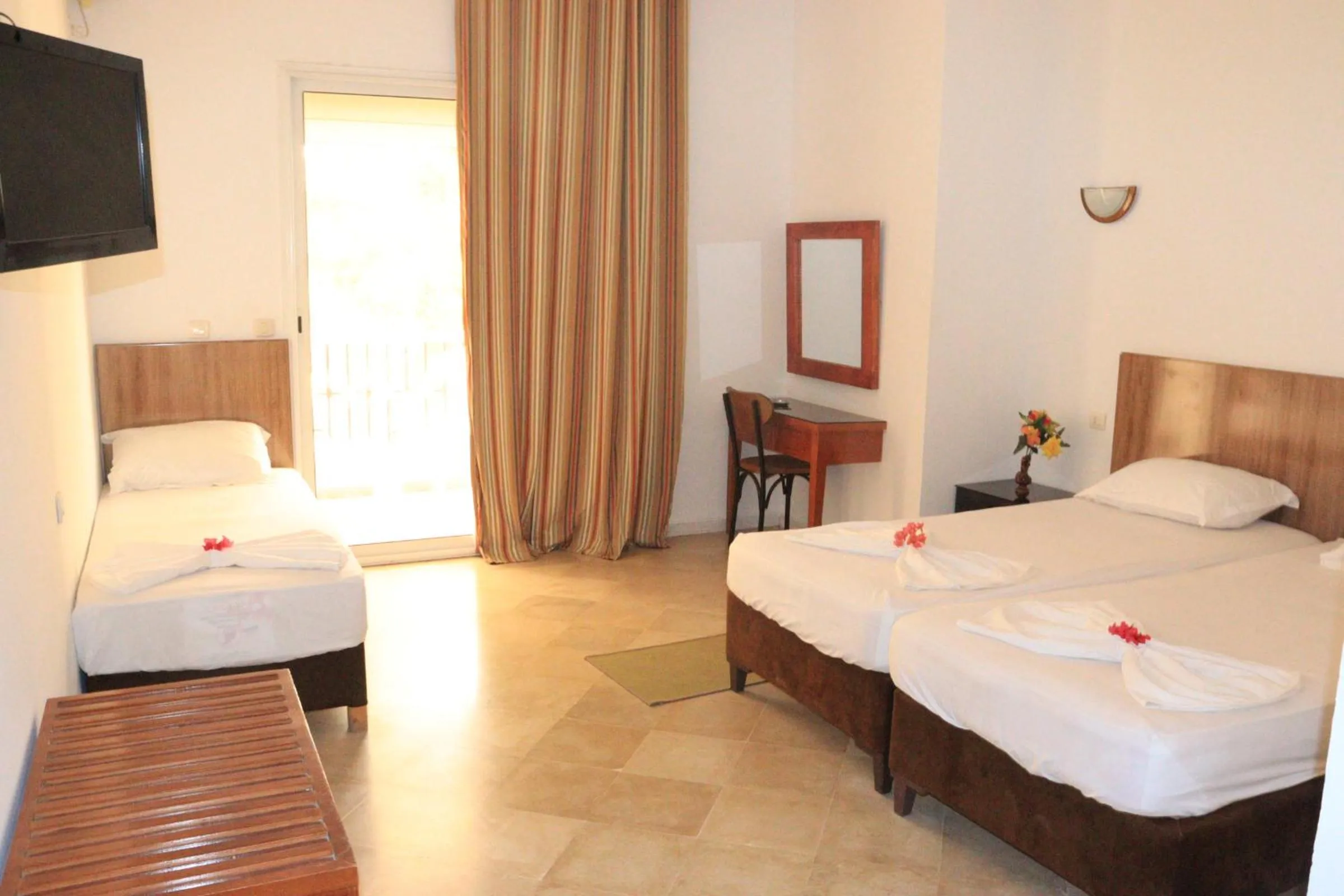 Bed in Le Grand Hotel Djerba