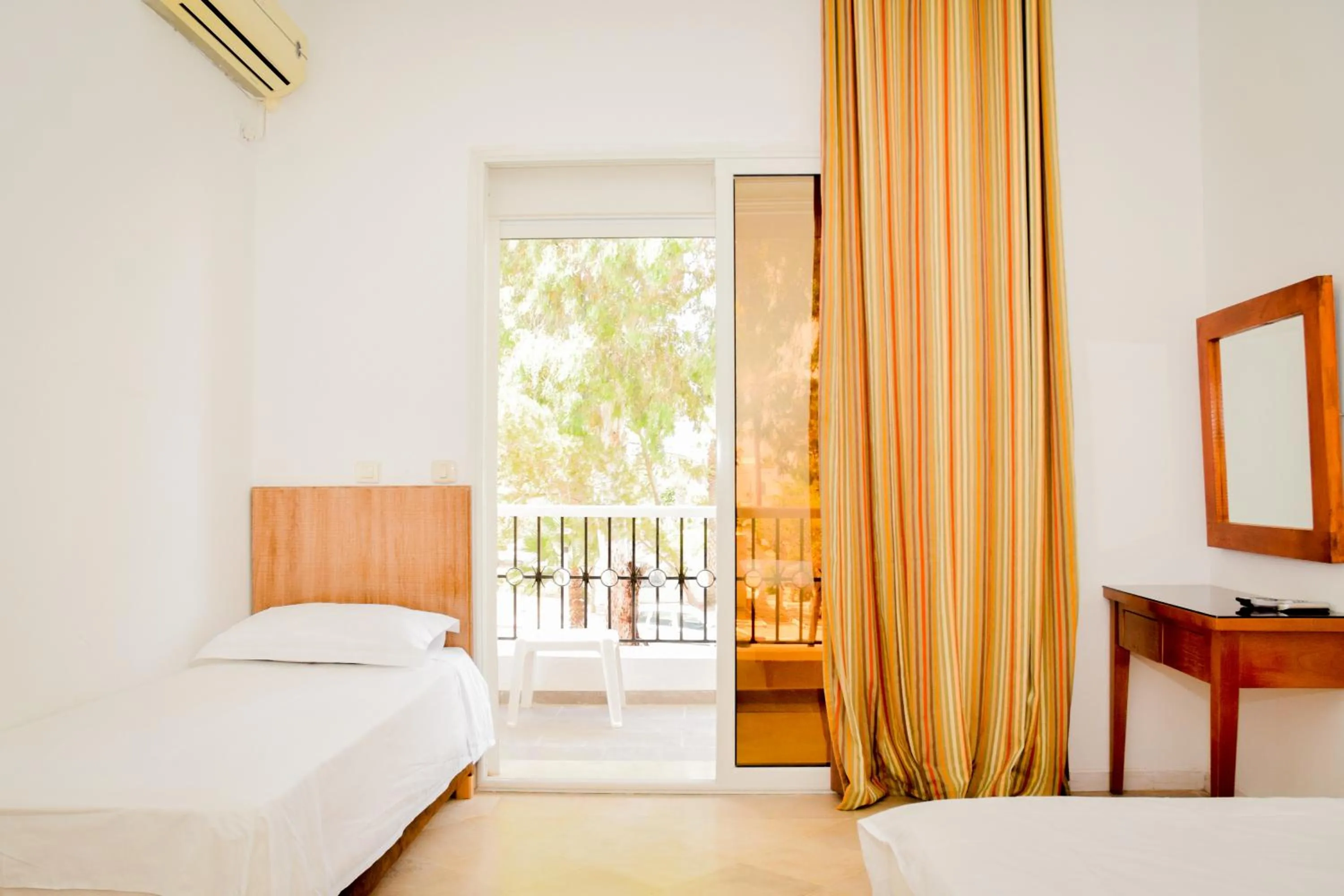 Bed in Le Grand Hotel Djerba