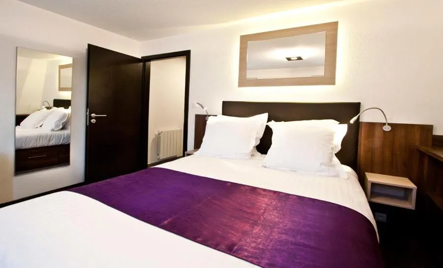 Bed in Appartements Le Hupsa Pfannala