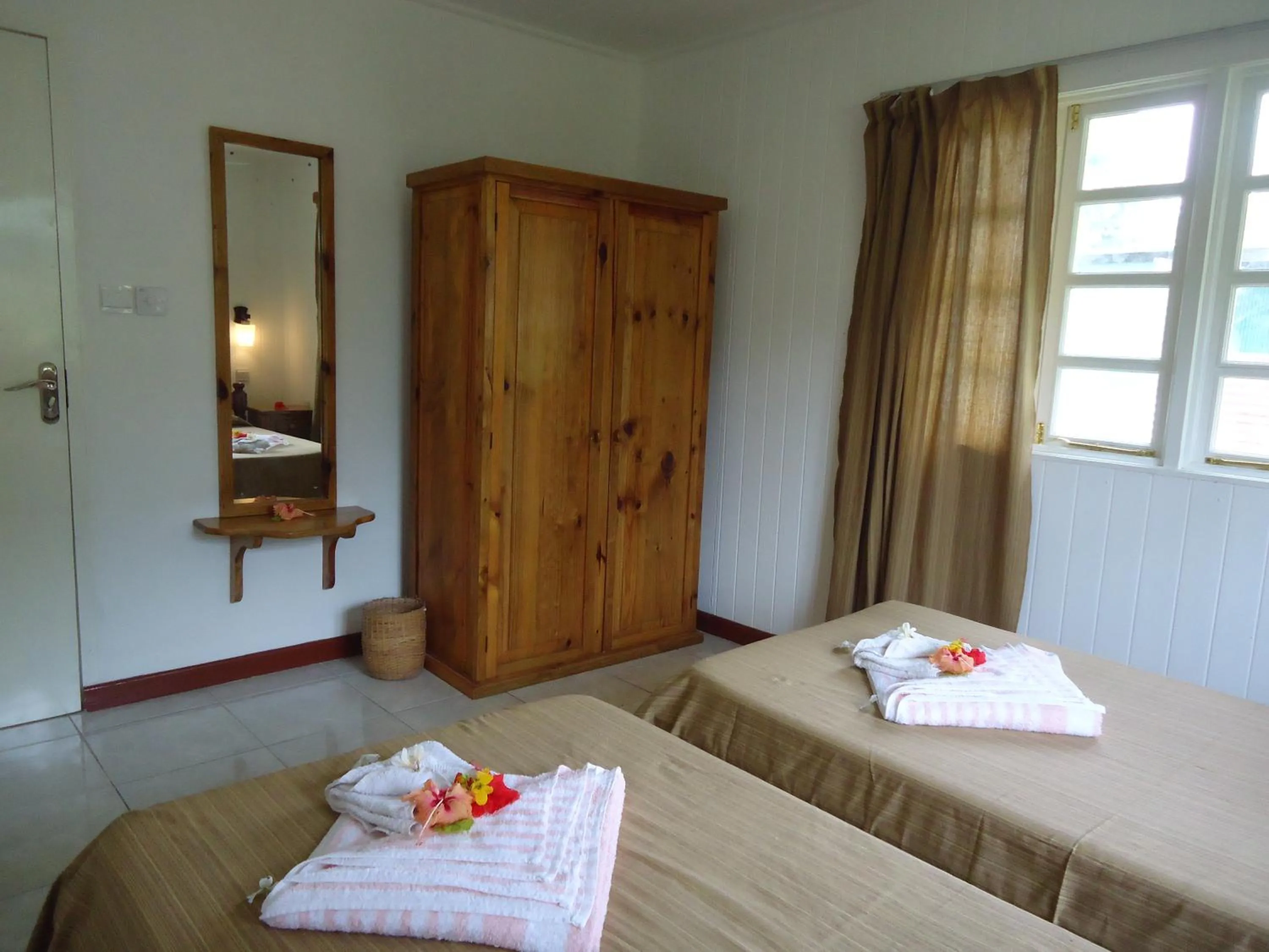 Decorative detail, Bed in Chez Michellin Pensions Residence