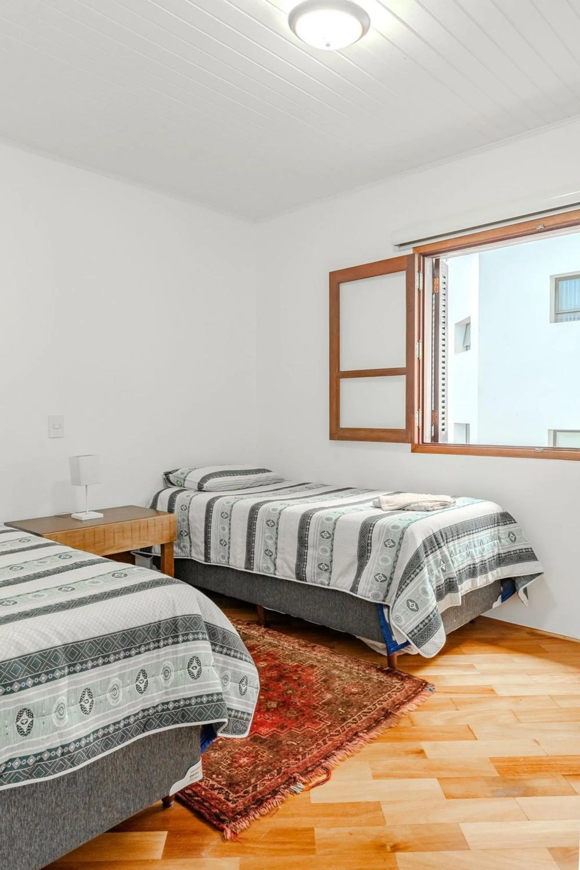 Bed in Lindo Apartamento próximo ao centro do Capivari