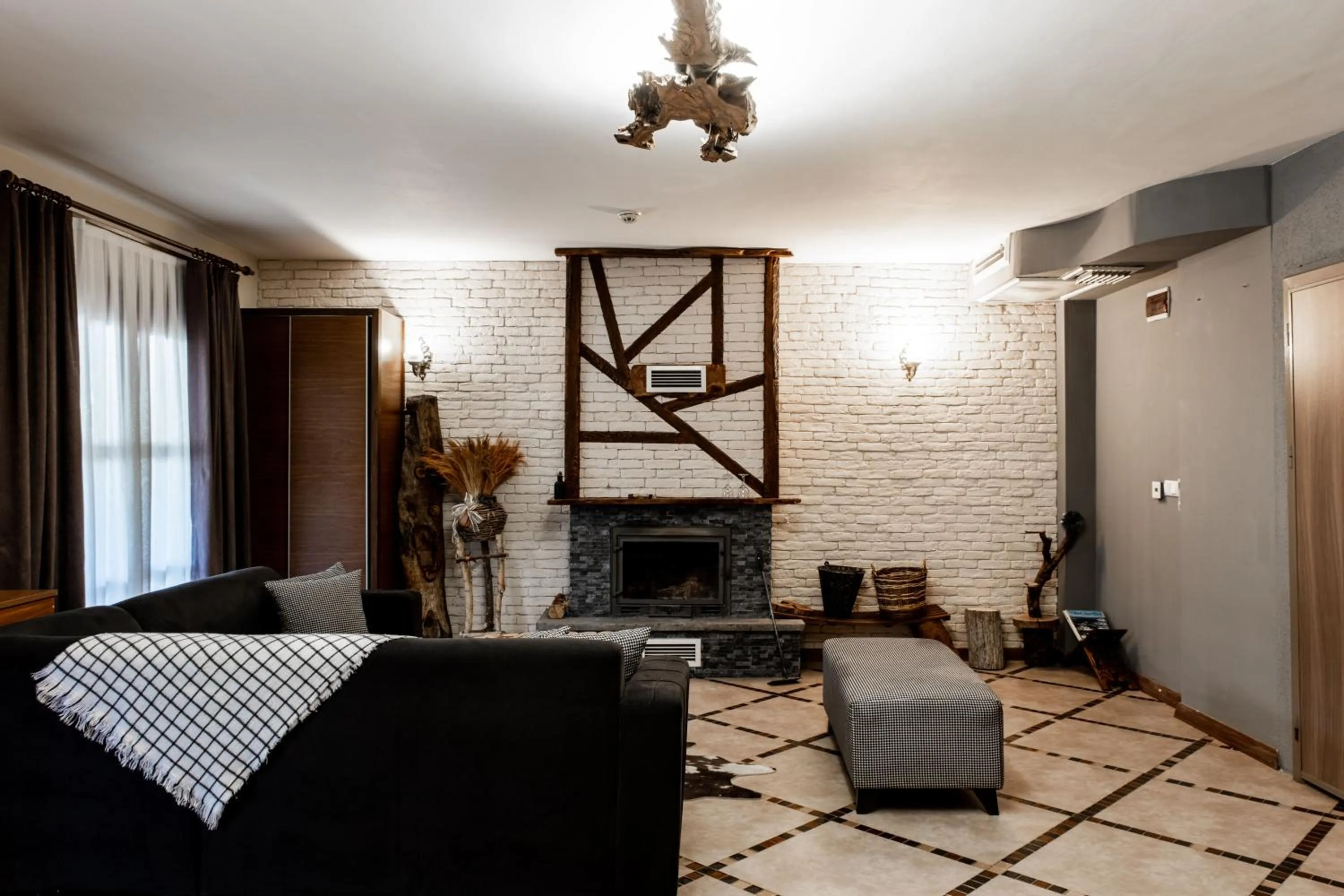 Seating area in Espira by Antioch Hotel