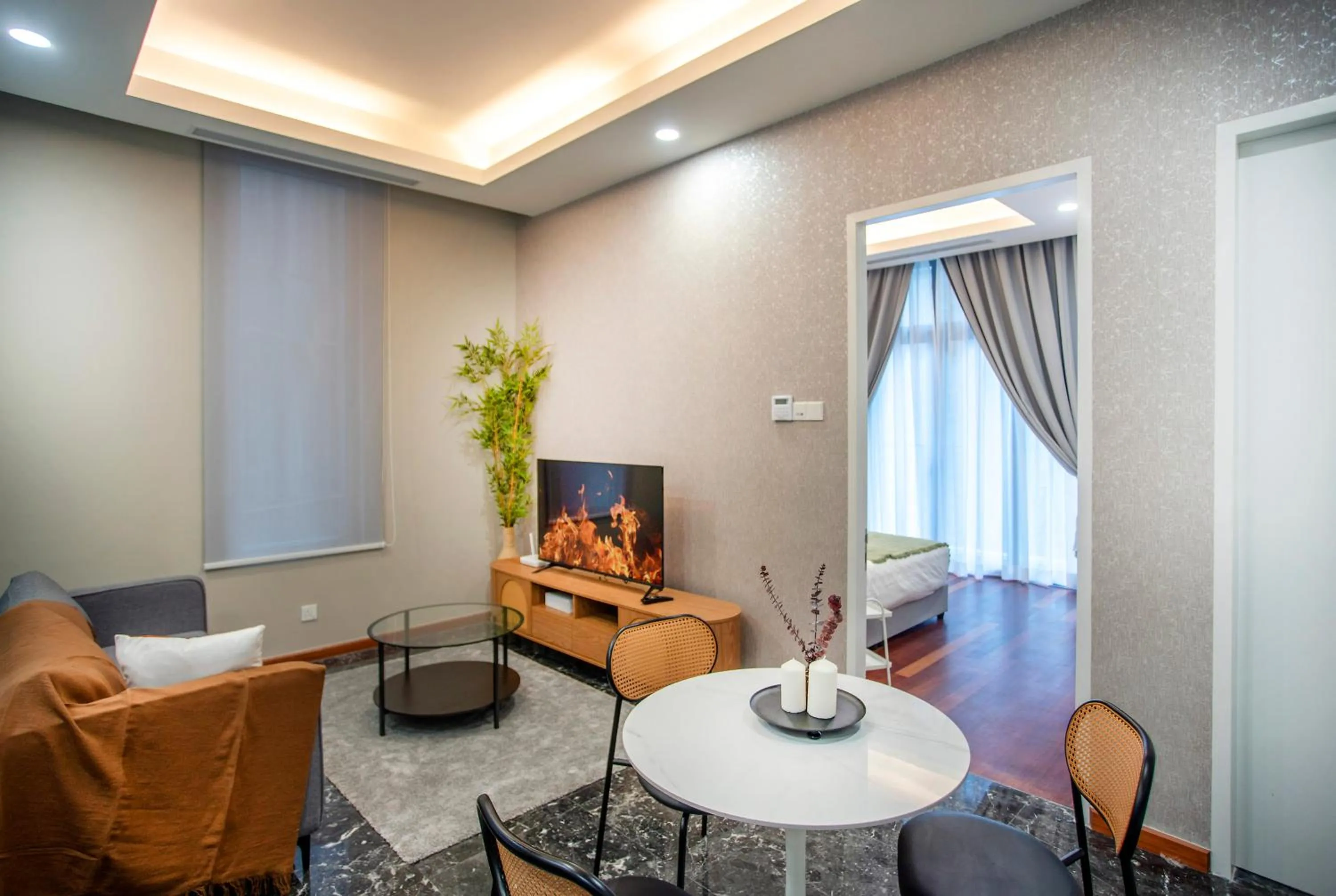 Communal lounge/ TV room in Royce Residence KLCC by Cobnb