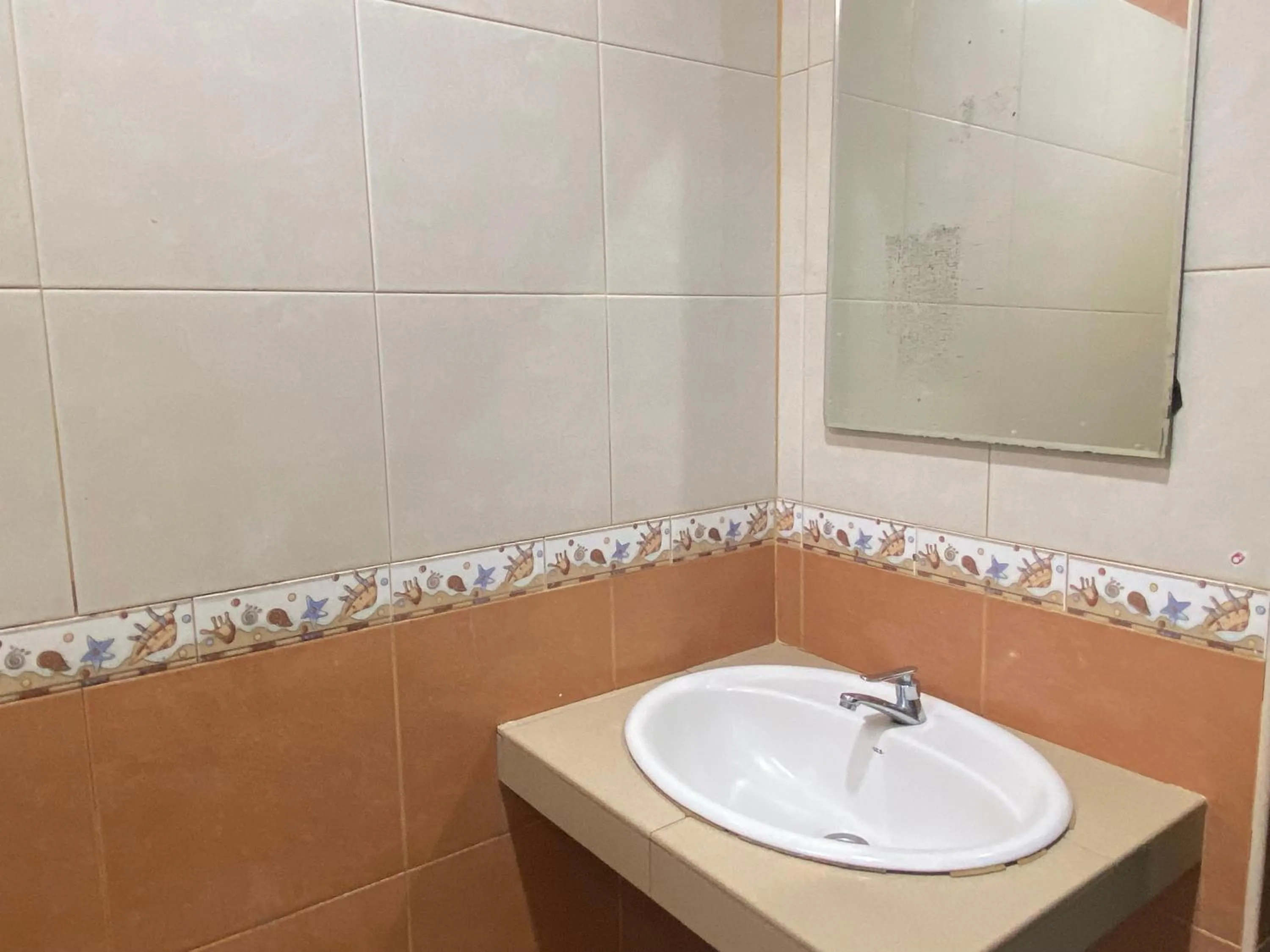 Bathroom in Hotel O Gold Hill Hotel