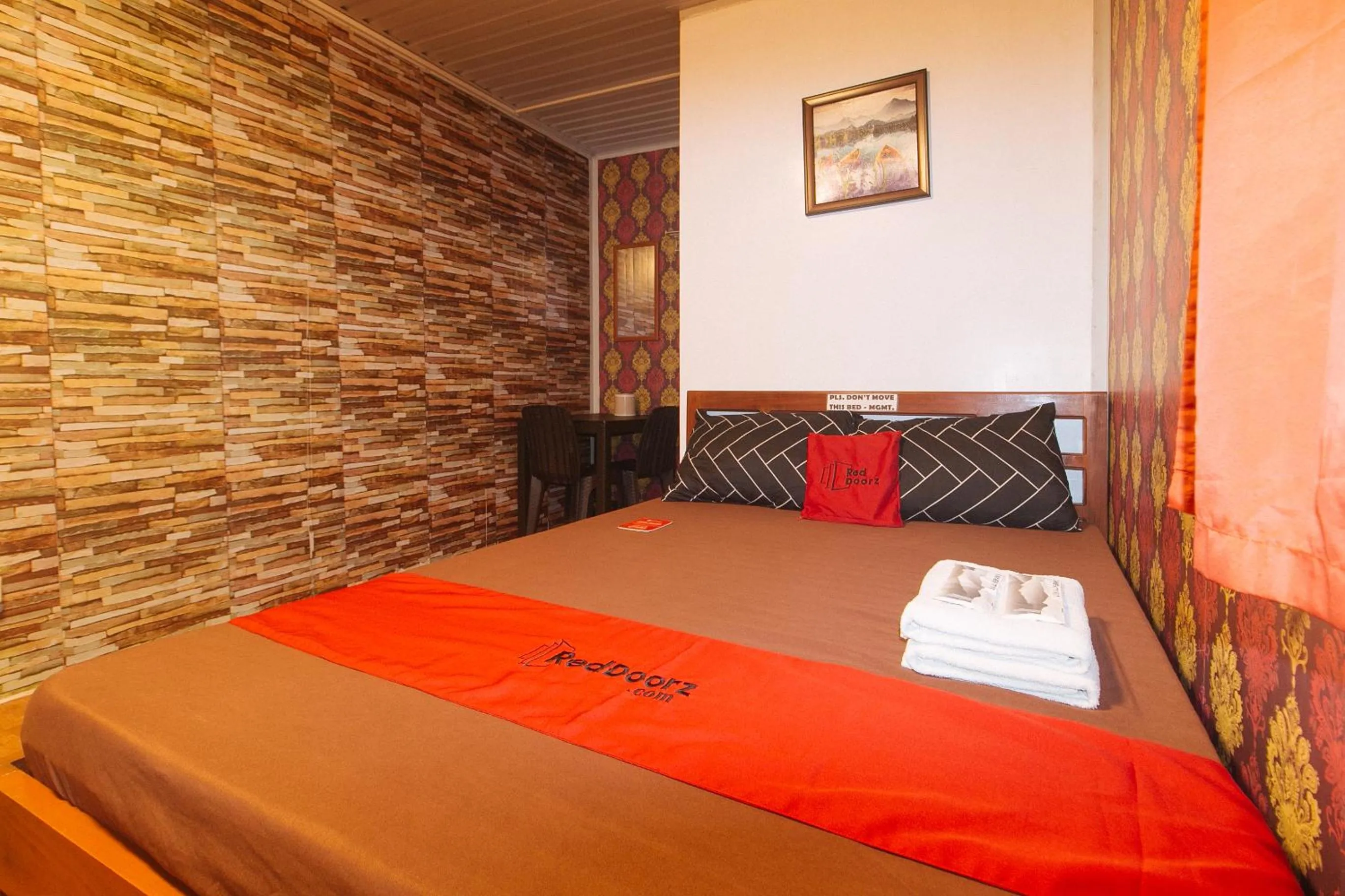 Photo of the whole room, Bed in RedDoorz @ Boondocks Cabins Resort