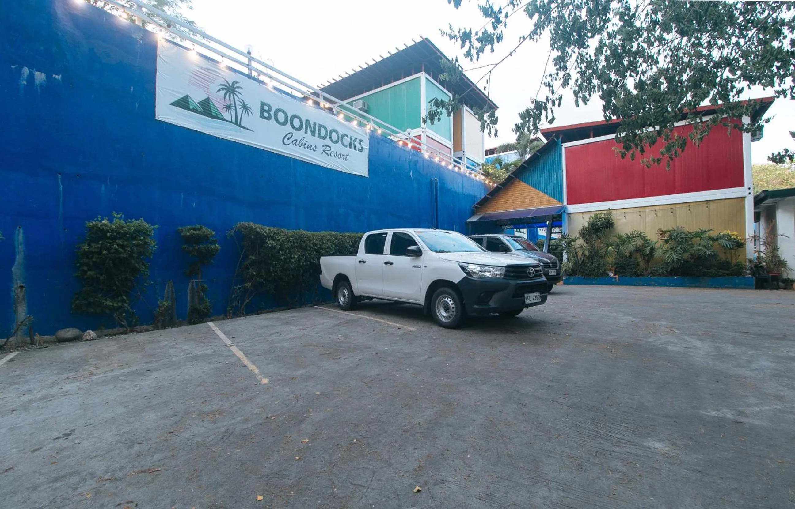 Parking in RedDoorz @ Boondocks Cabins Resort