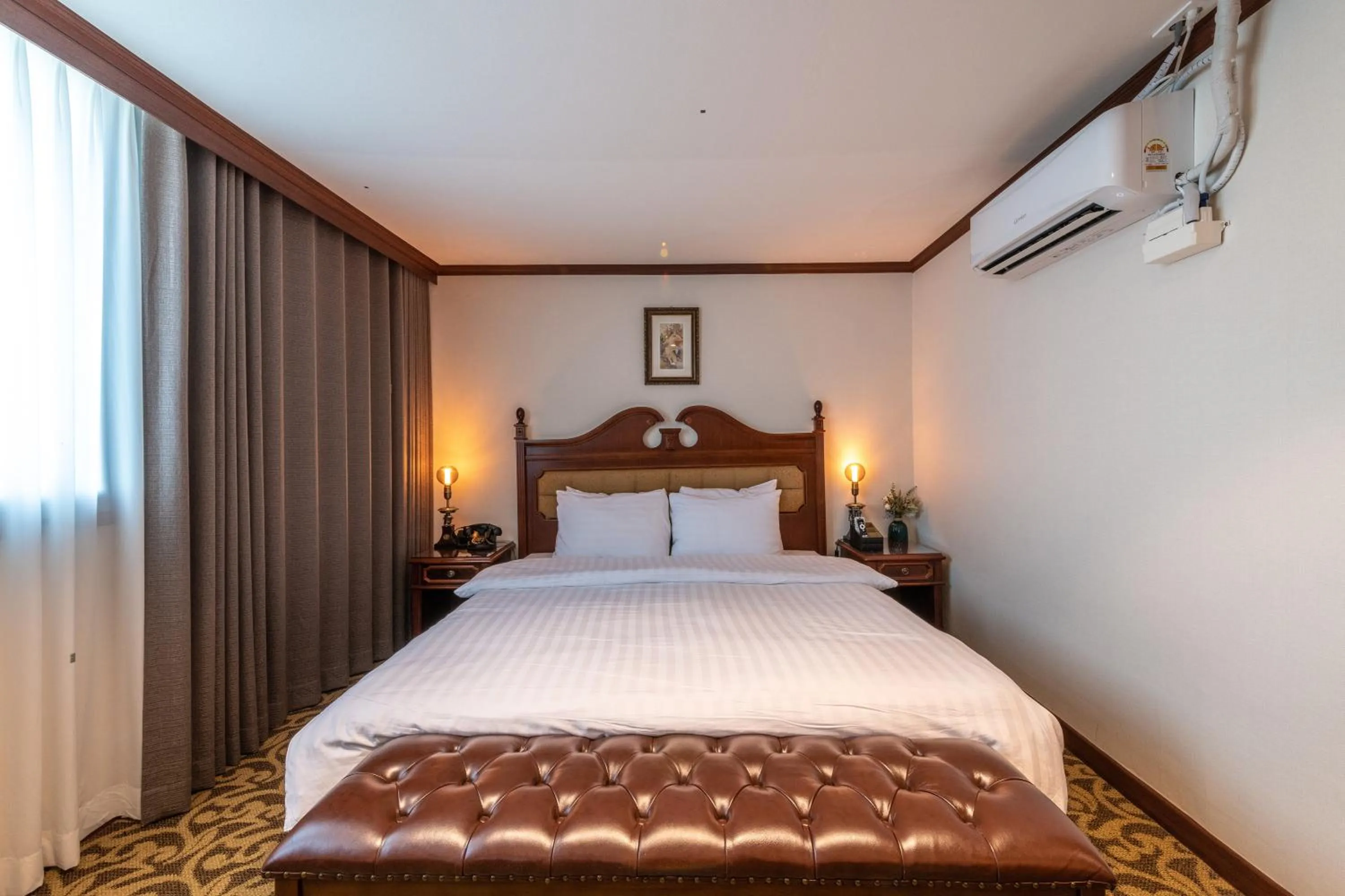 Bed in New Cheonji Hotel