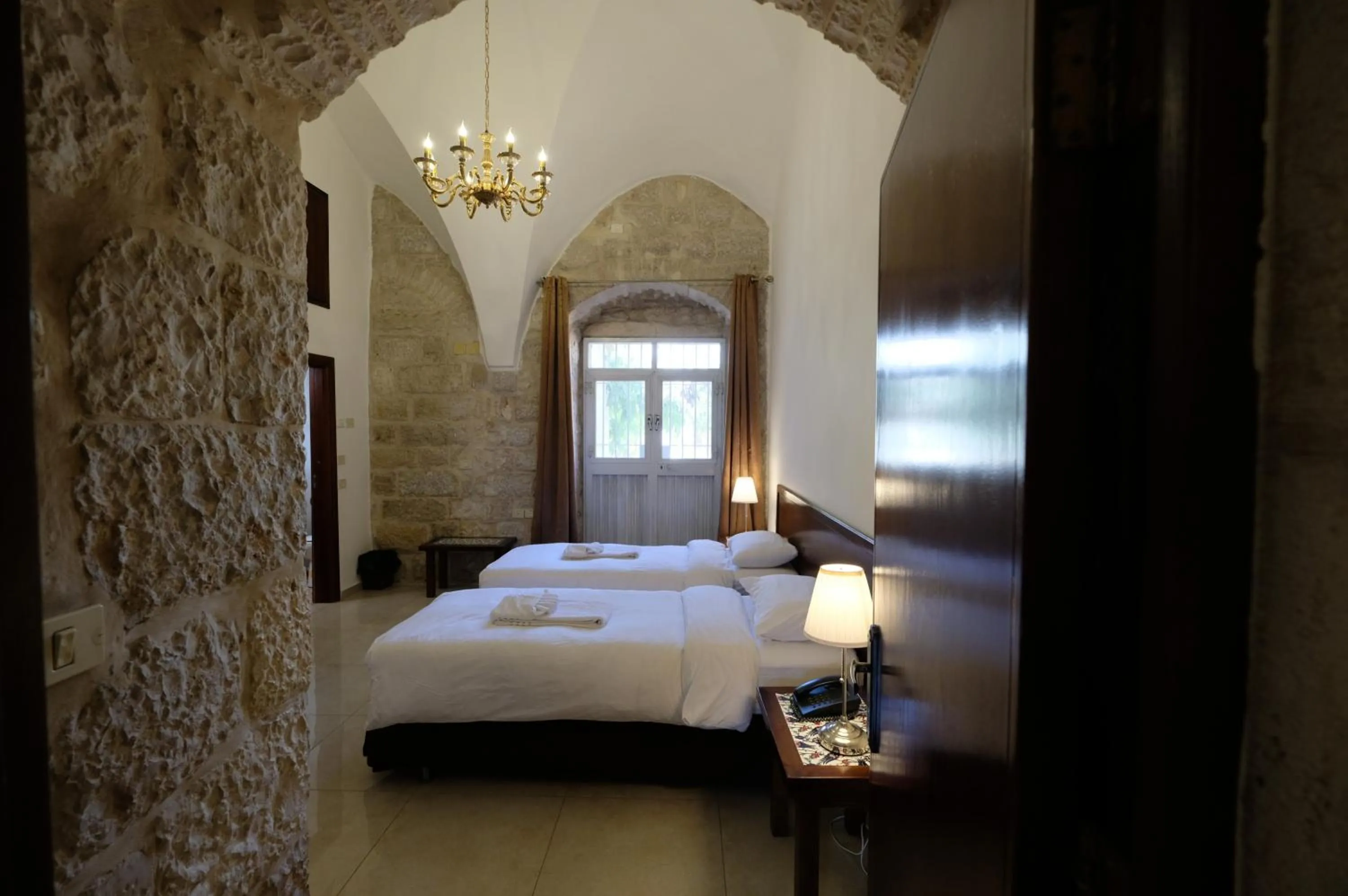 Photo of the whole room, Bed in St. George’s Cathedral Pilgrim Guesthouse – Jerusalem