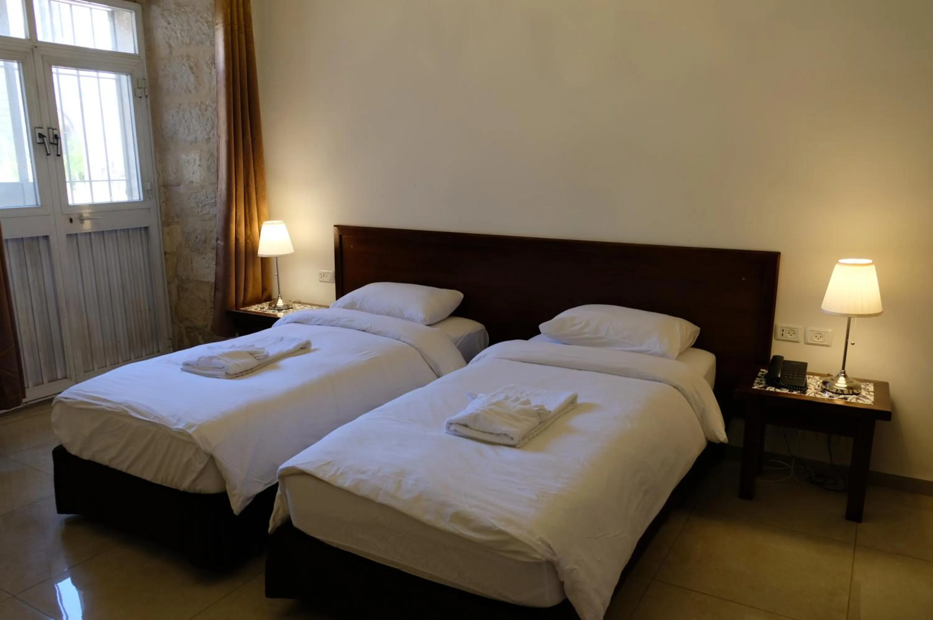 Photo of the whole room, Bed in St. George’s Cathedral Pilgrim Guesthouse – Jerusalem