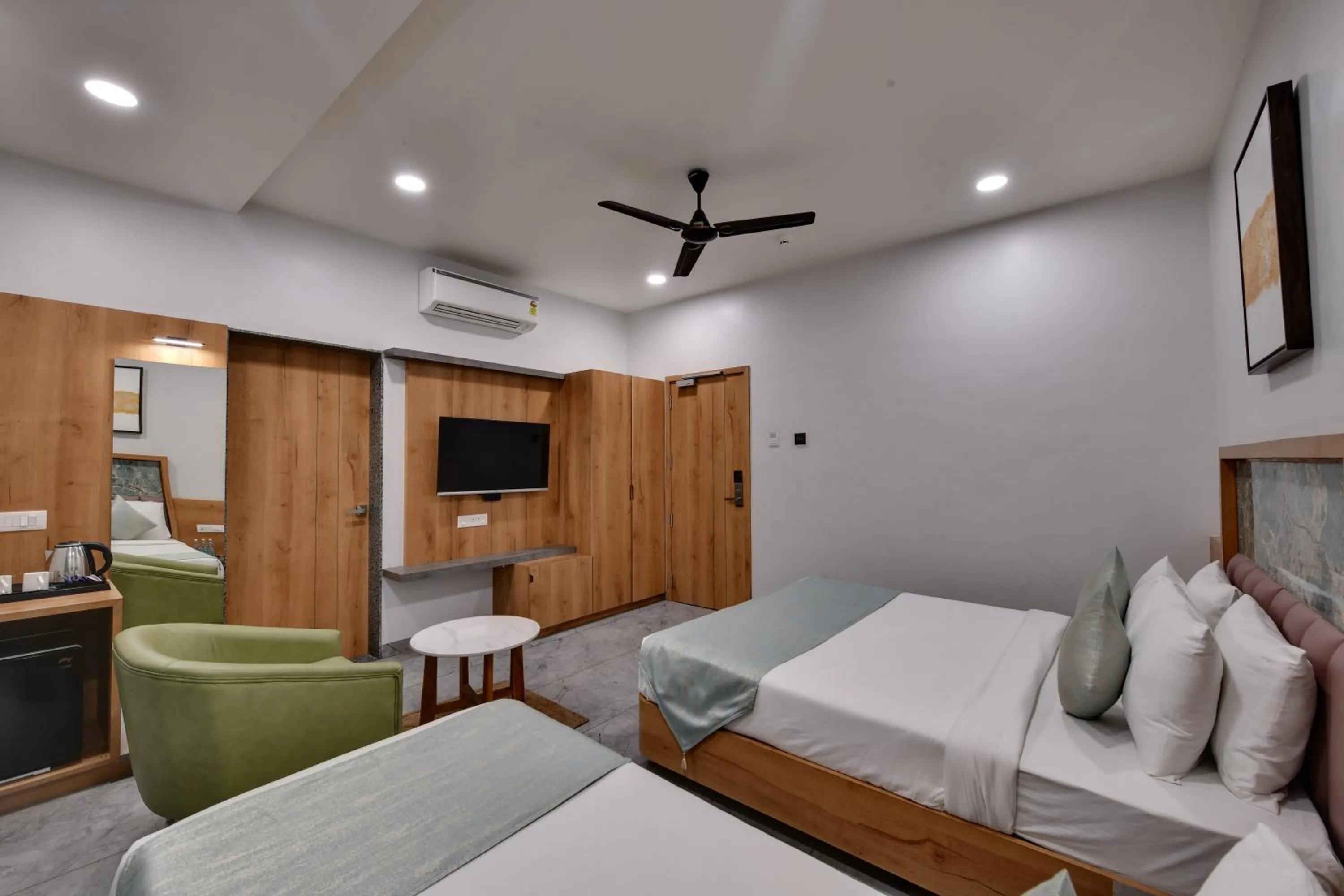 Bedroom in HOTEL RADHIKA