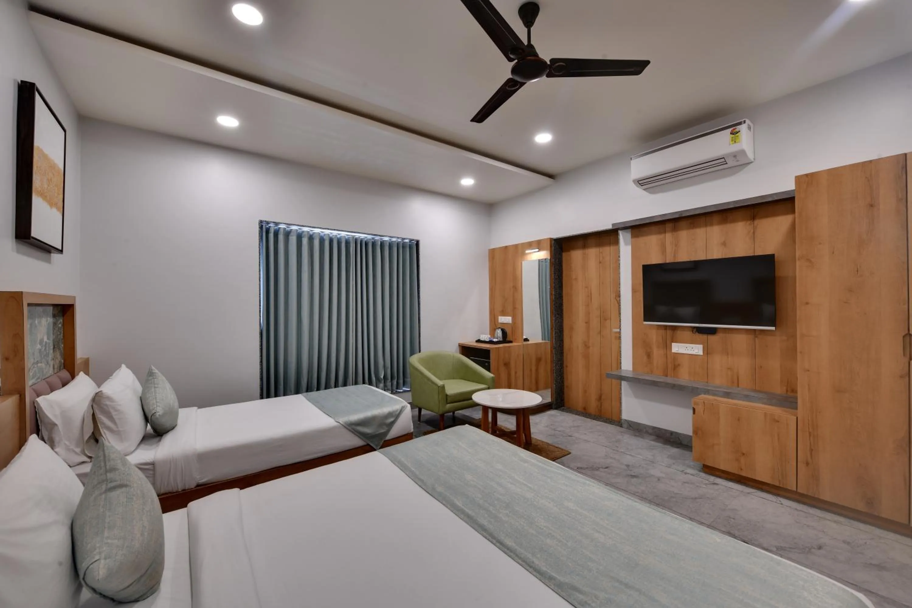 Bedroom in HOTEL RADHIKA