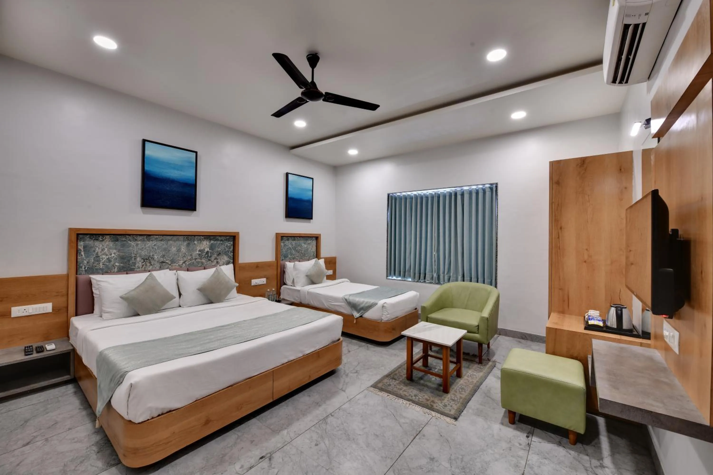 Bedroom in HOTEL RADHIKA