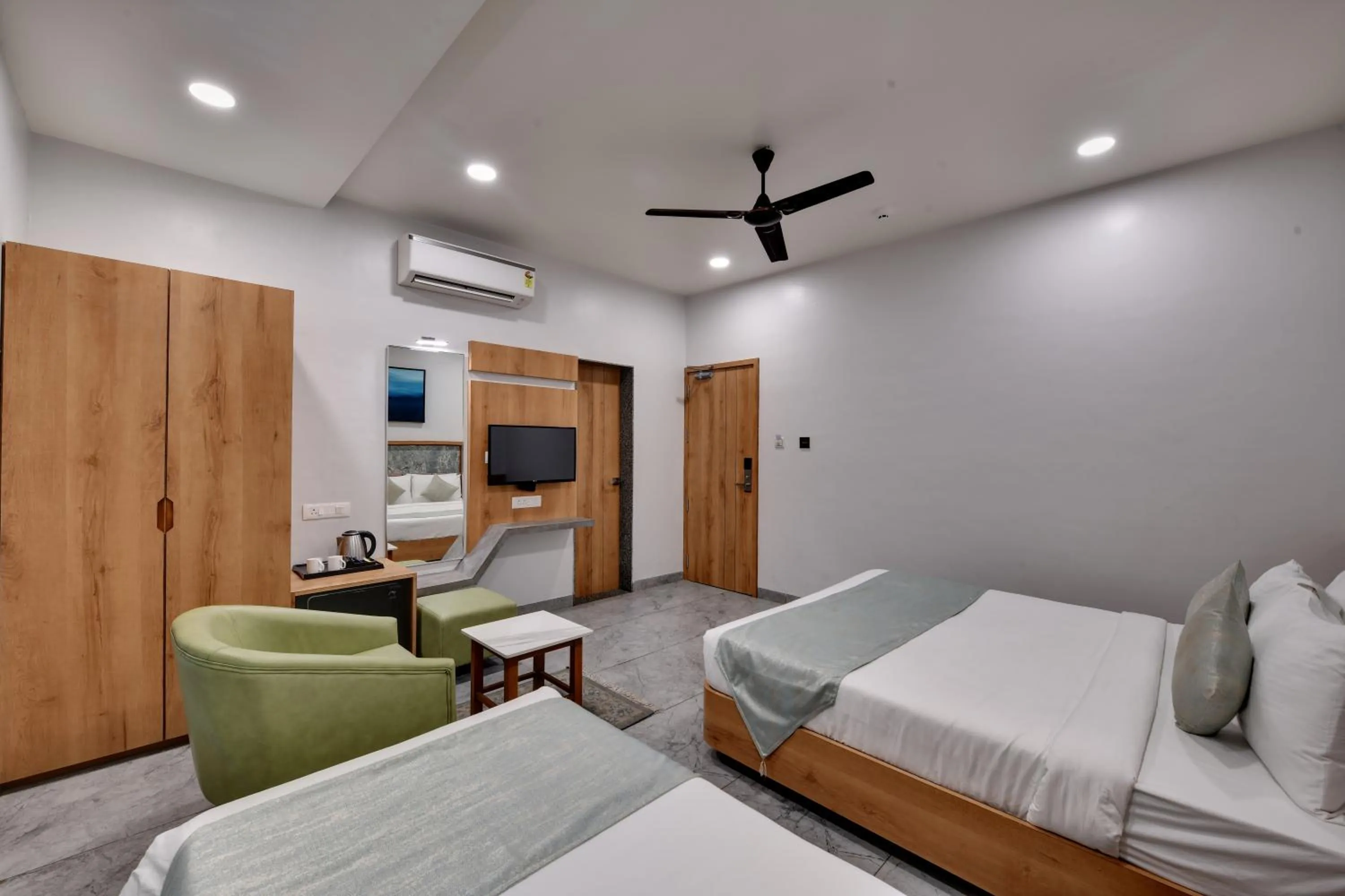 Bedroom in HOTEL RADHIKA