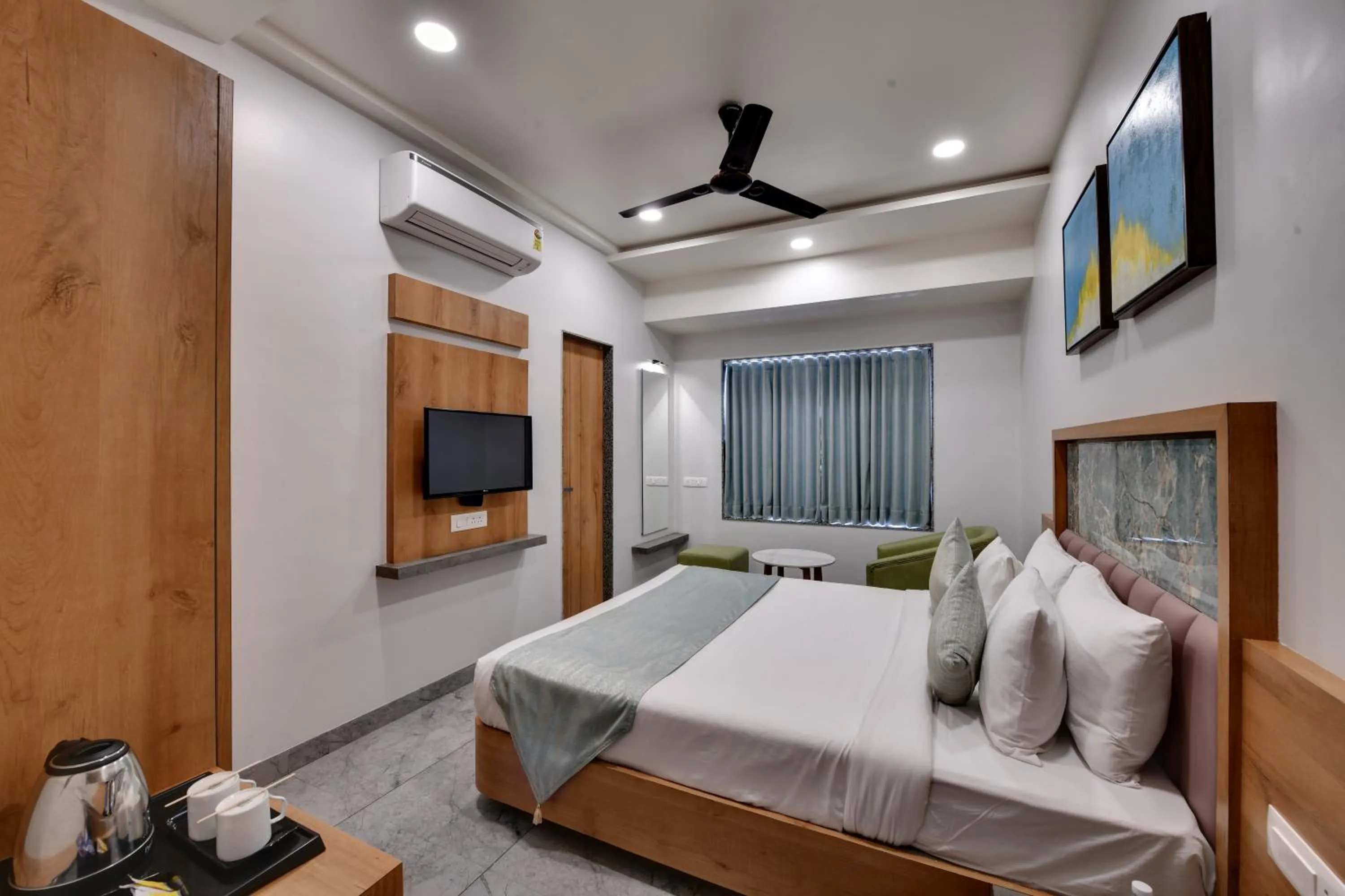 Bedroom in HOTEL RADHIKA