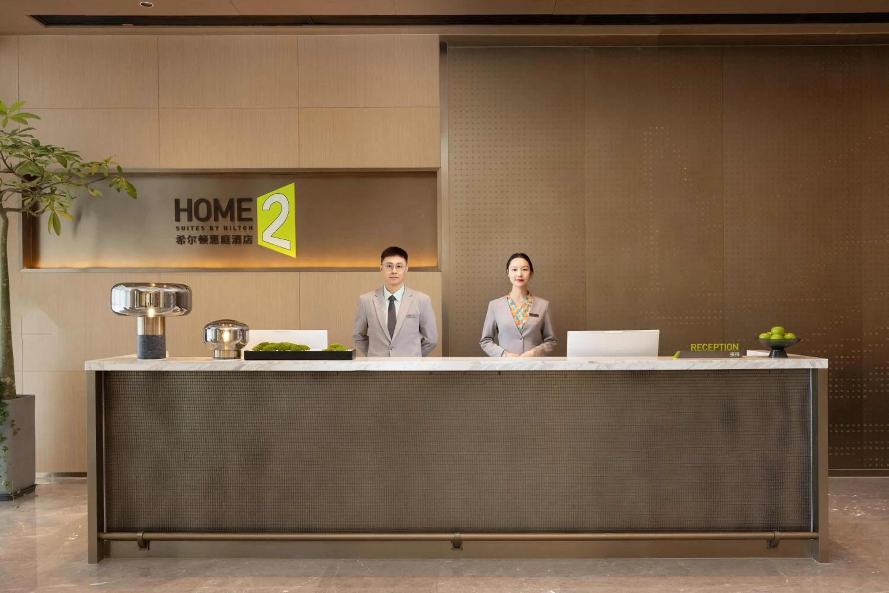 Staff in Home2 Suites By Hilton Hotel Guangzhou Baiyun International Airport Branch - Free Shuttle Bus to Guangzhou Baiyun International Airport & Free Deliver Service to Canton Fair Complex During Canton Fair Period