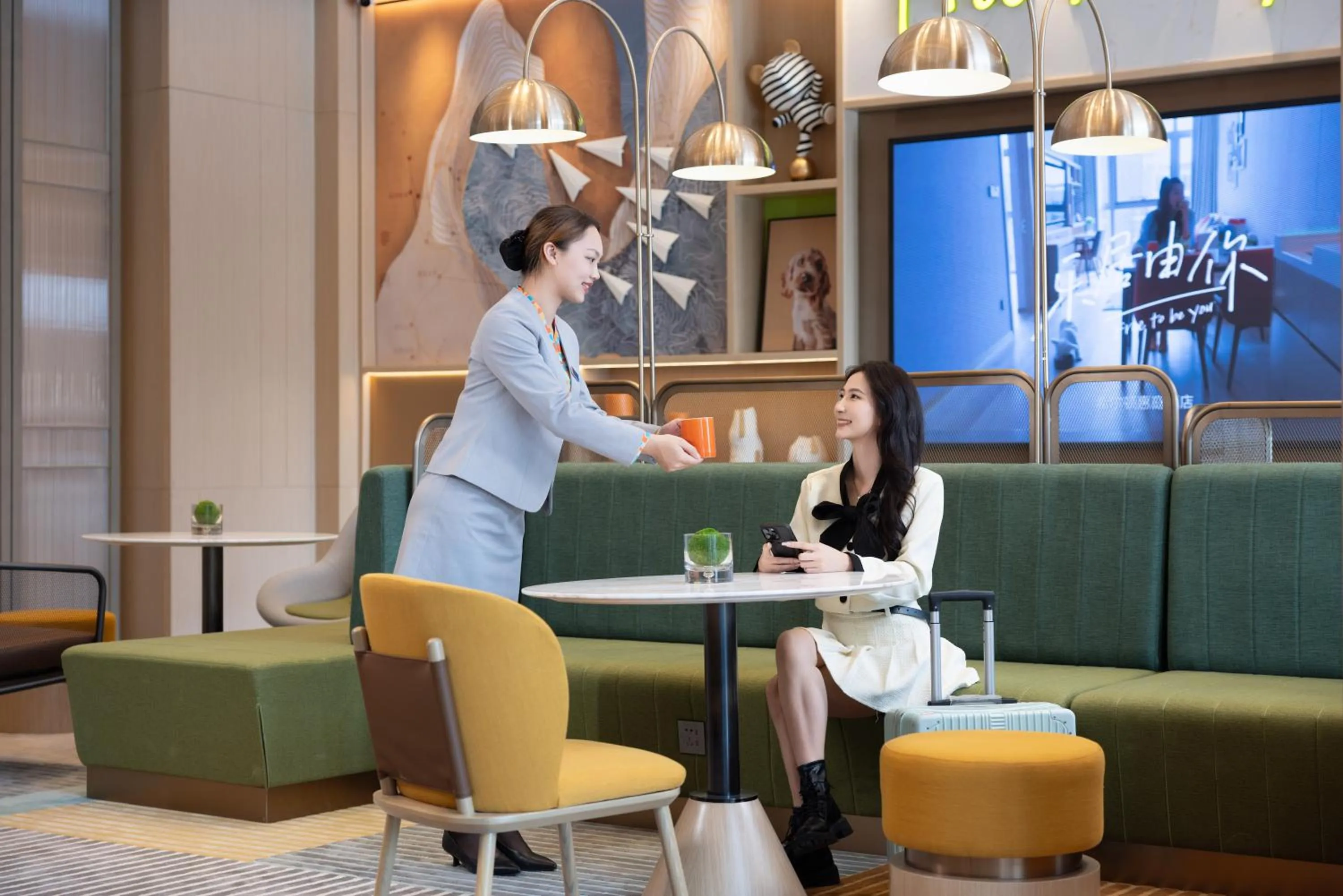 Staff in Home2 Suites By Hilton Hotel Guangzhou Baiyun International Airport Branch - Free Shuttle Bus to Guangzhou Baiyun International Airport & Free Deliver Service to Canton Fair Complex During Canton Fair Period