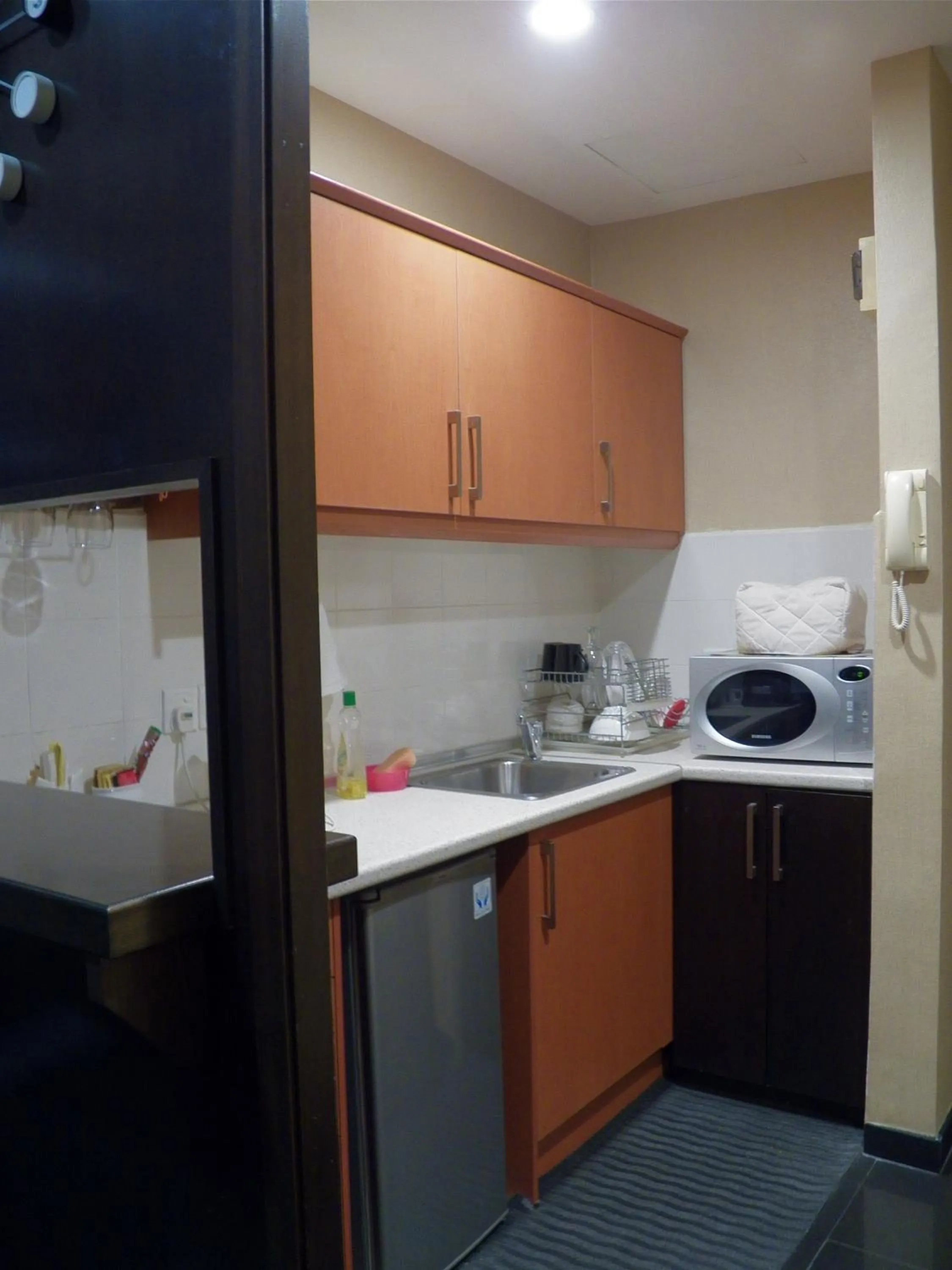 Kitchen or kitchenette in Maytower Apartment